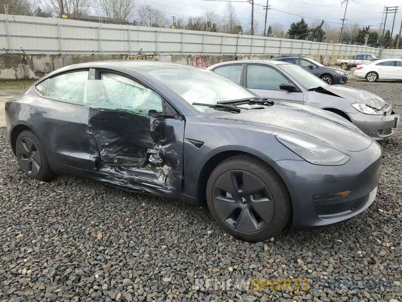 4 Photograph of a damaged car 5YJ3E1EA2PF640664 TESLA MODEL 3 2023