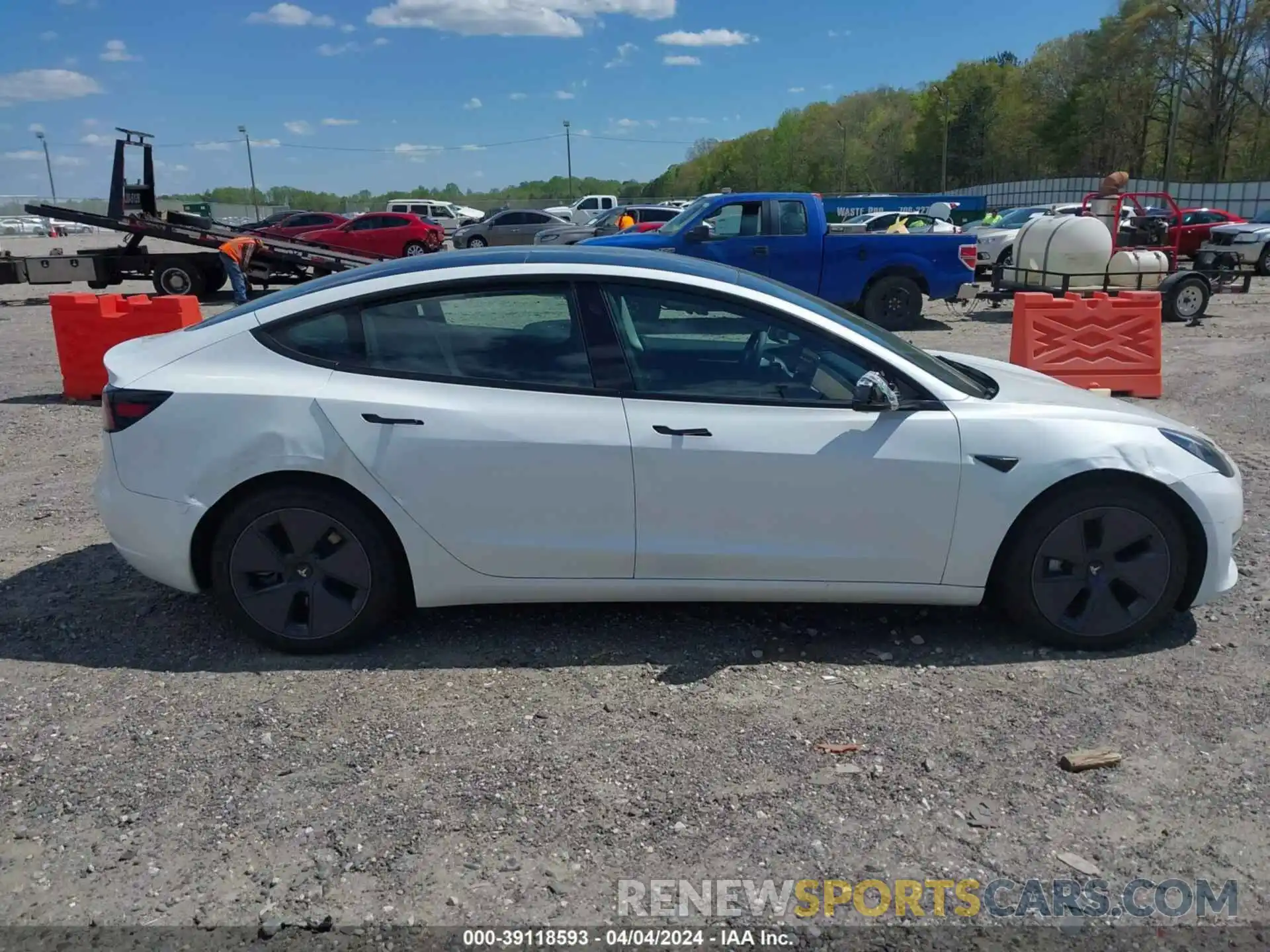 12 Photograph of a damaged car 5YJ3E1EA4PF599602 TESLA MODEL 3 2023