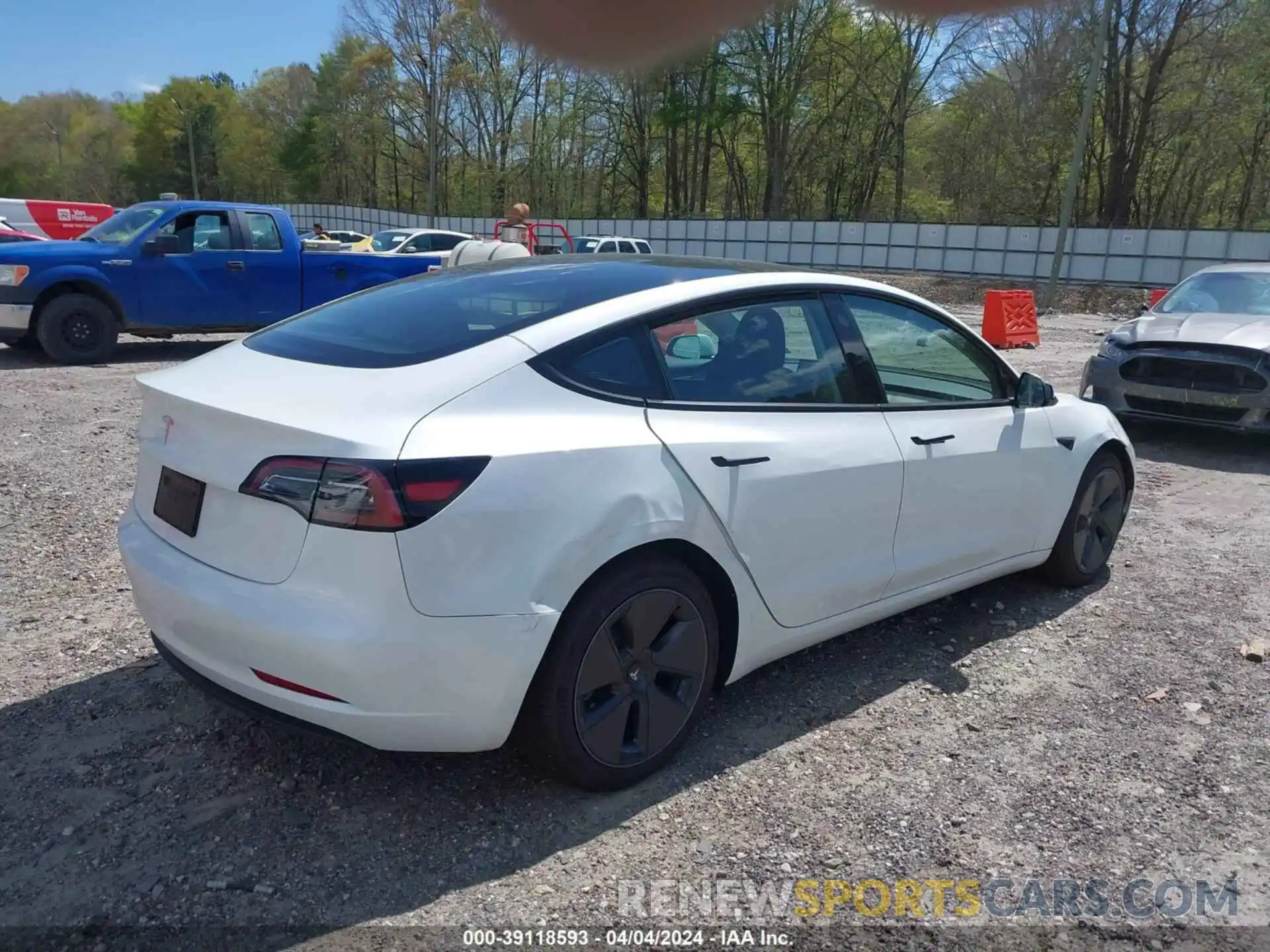 4 Photograph of a damaged car 5YJ3E1EA4PF599602 TESLA MODEL 3 2023