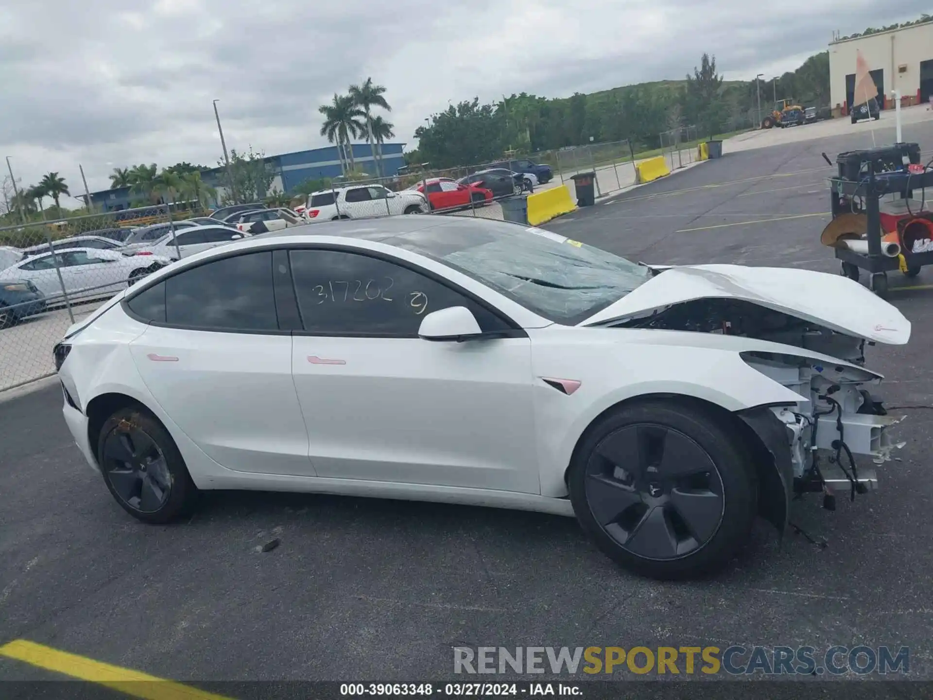 12 Photograph of a damaged car 5YJ3E1EA5PF411136 TESLA MODEL 3 2023