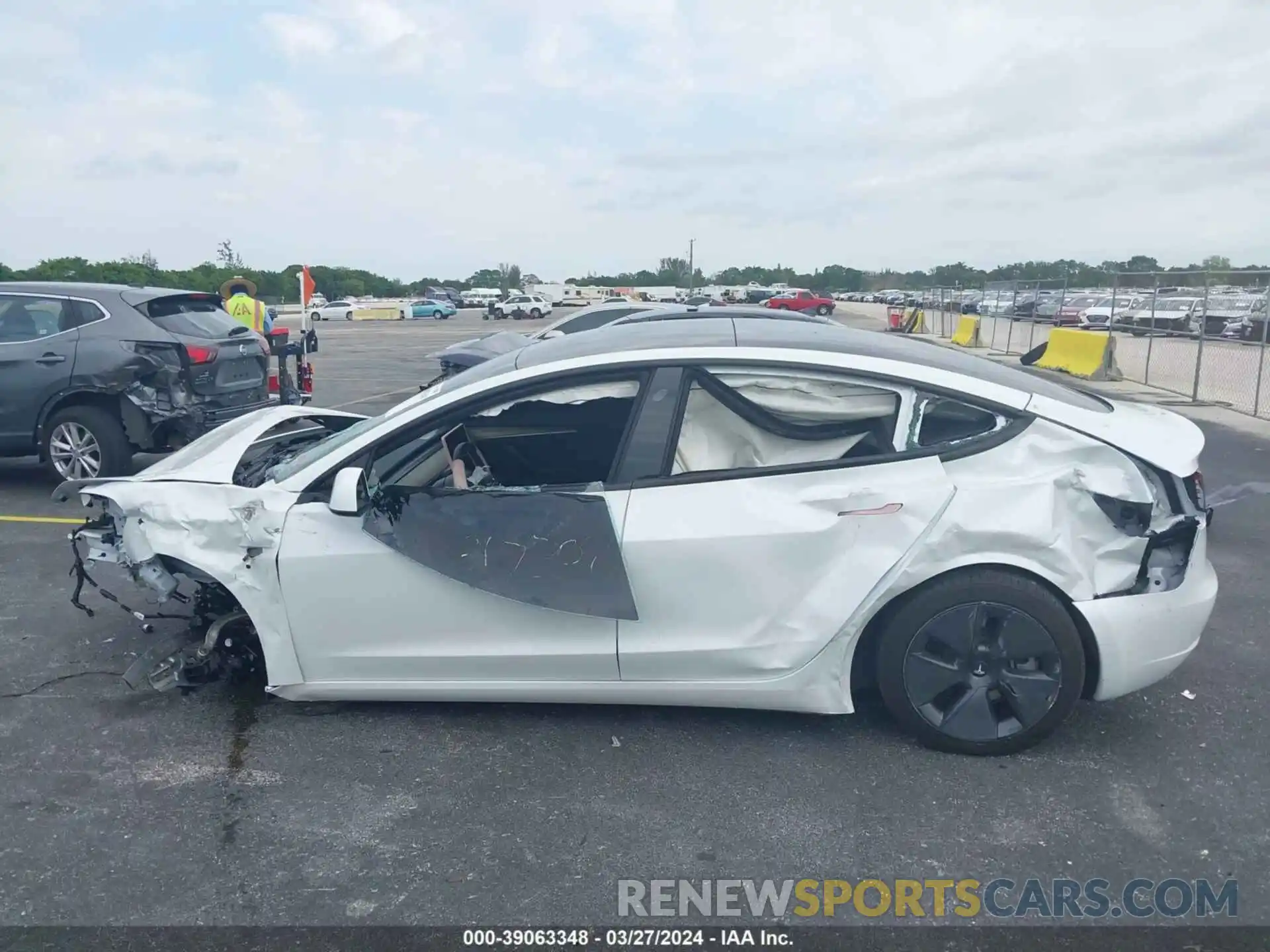 13 Photograph of a damaged car 5YJ3E1EA5PF411136 TESLA MODEL 3 2023