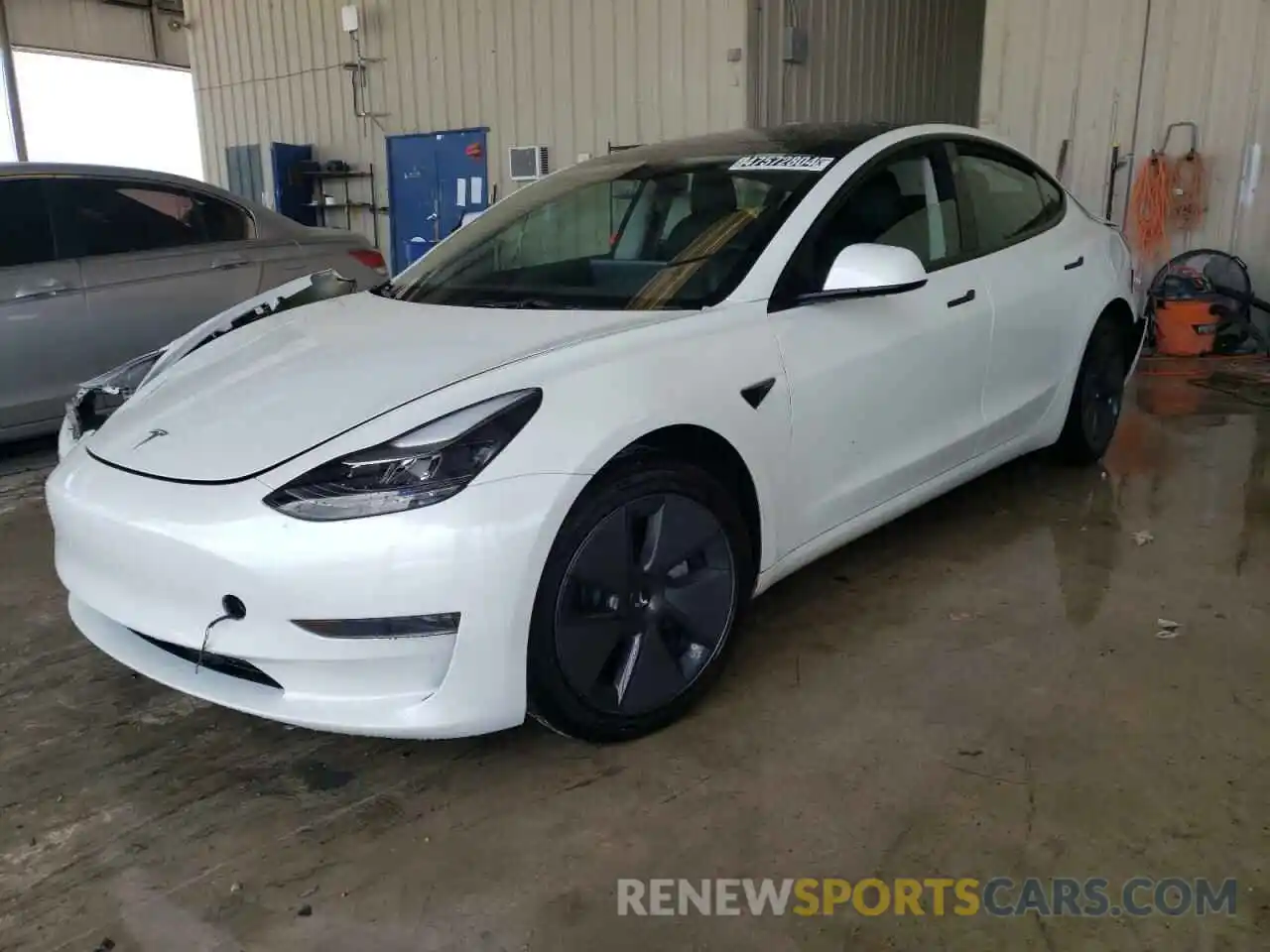 1 Photograph of a damaged car 5YJ3E1EA5PF450082 TESLA MODEL 3 2023