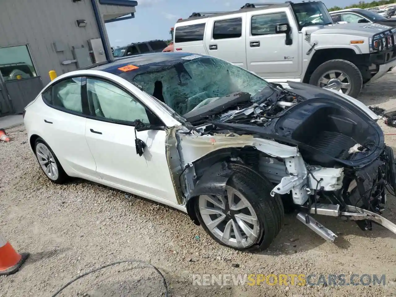 4 Photograph of a damaged car 5YJ3E1EA6PF447921 TESLA MODEL 3 2023