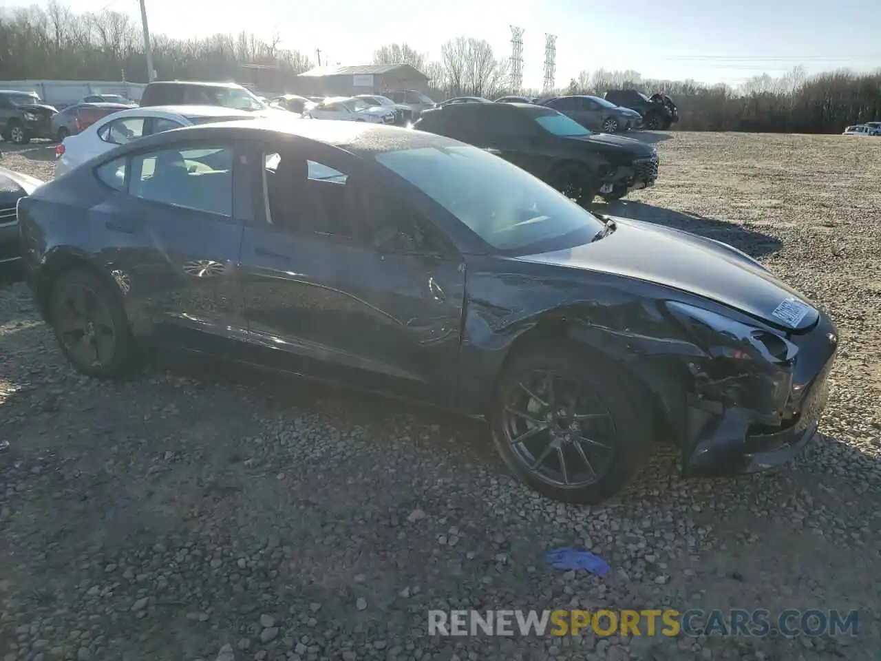 4 Photograph of a damaged car 5YJ3E1EAXPF594257 TESLA MODEL 3 2023