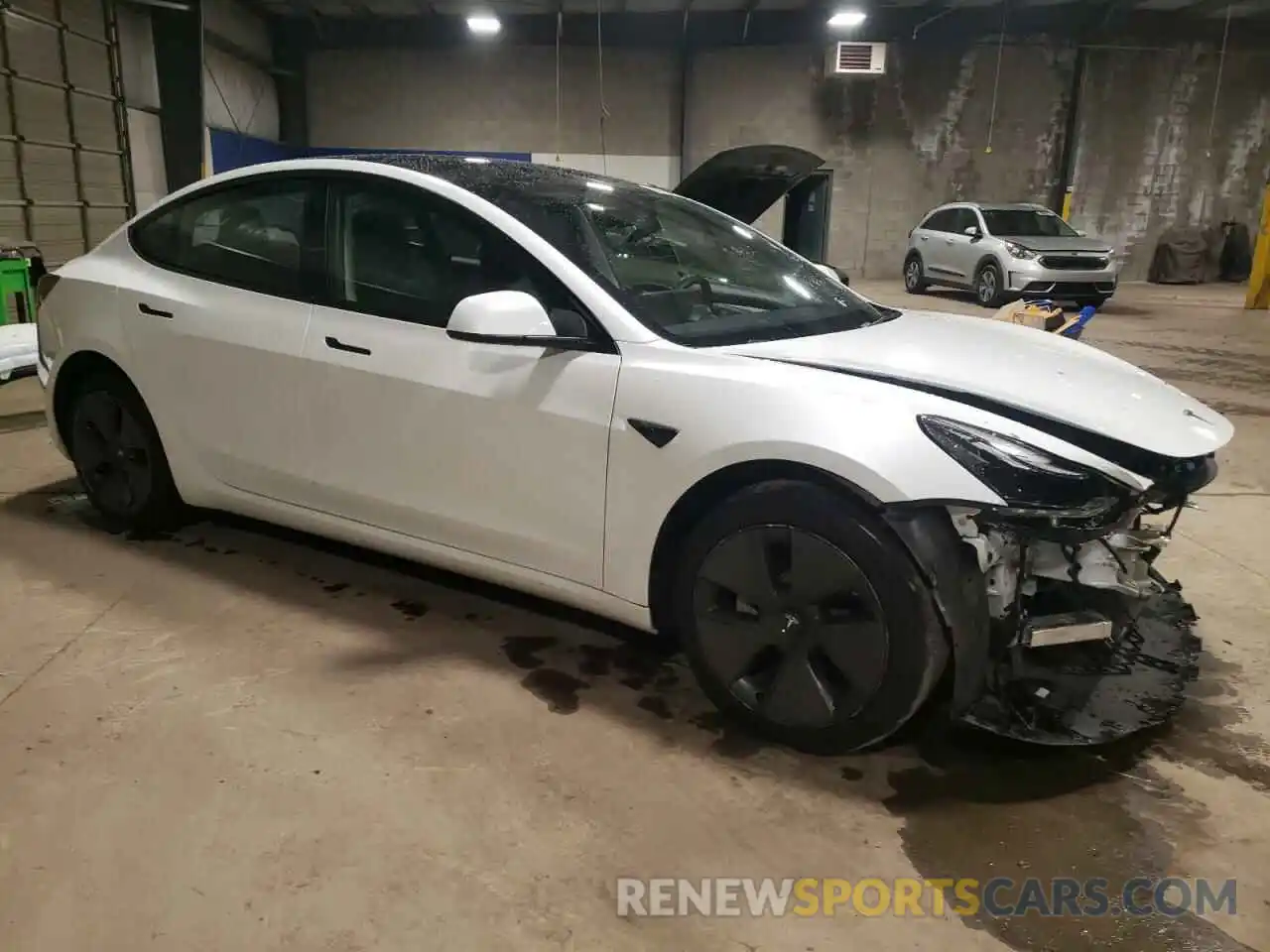 4 Photograph of a damaged car 5YJ3E1EB3PF592195 TESLA MODEL 3 2023