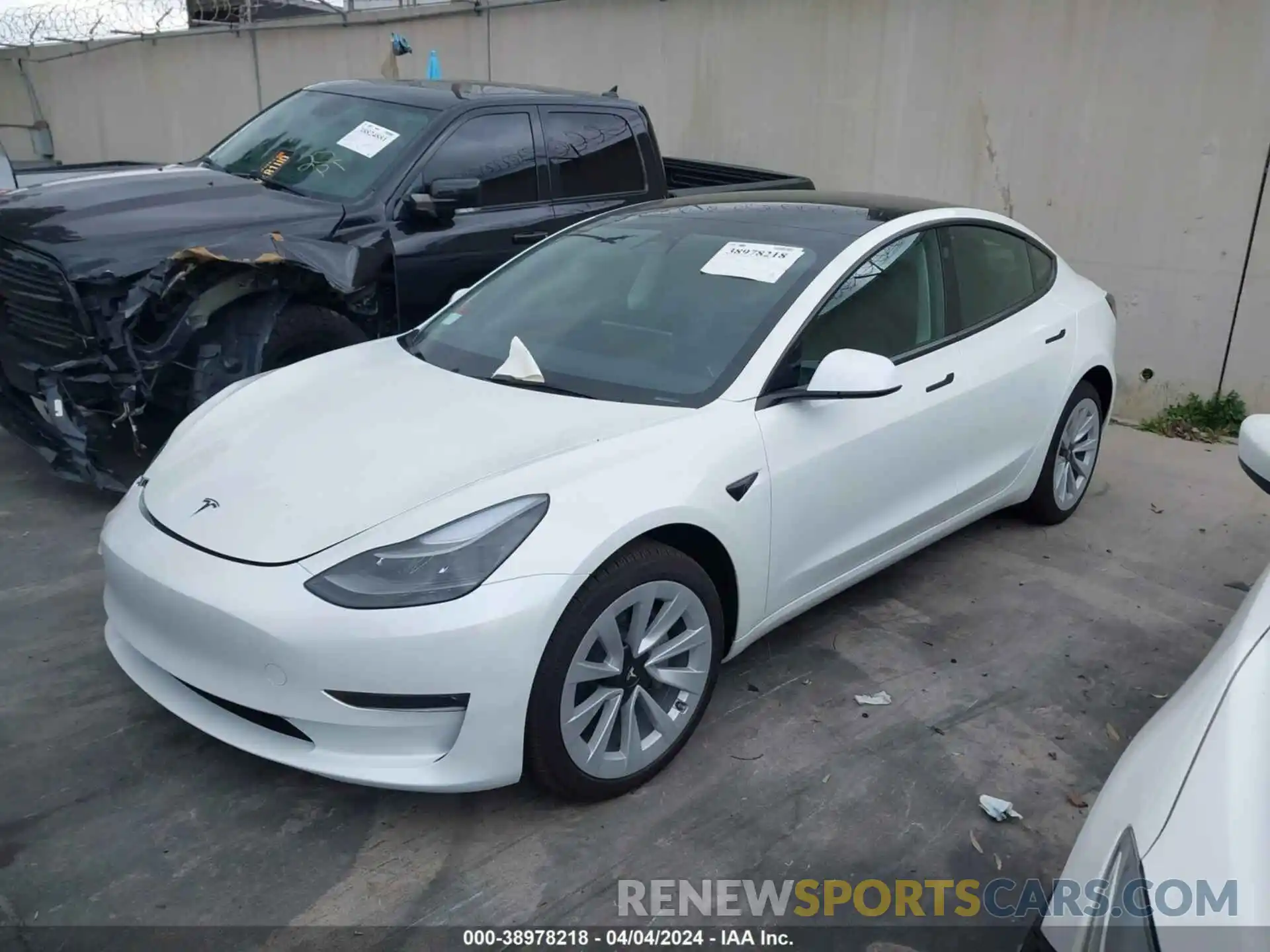 2 Photograph of a damaged car 5YJ3E1EB8PF706613 TESLA MODEL 3 2023