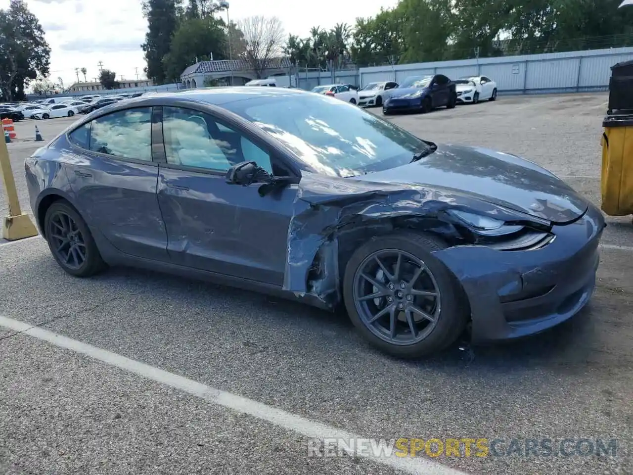 4 Photograph of a damaged car 5YJ3E1EB9PF703493 TESLA MODEL 3 2023