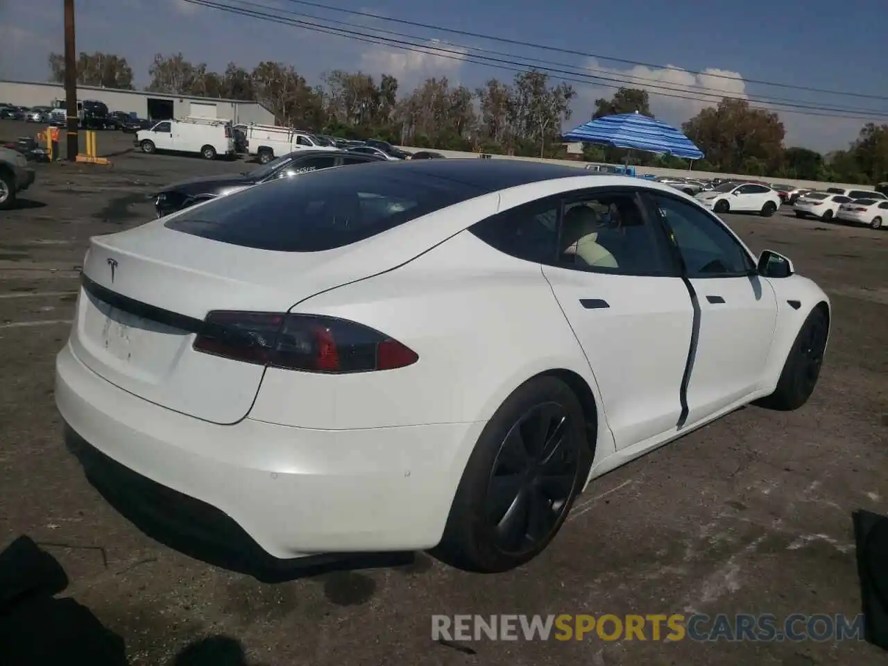 4 Photograph of a damaged car 5YJSA1E55NF467102 TESLA MODEL S 2022