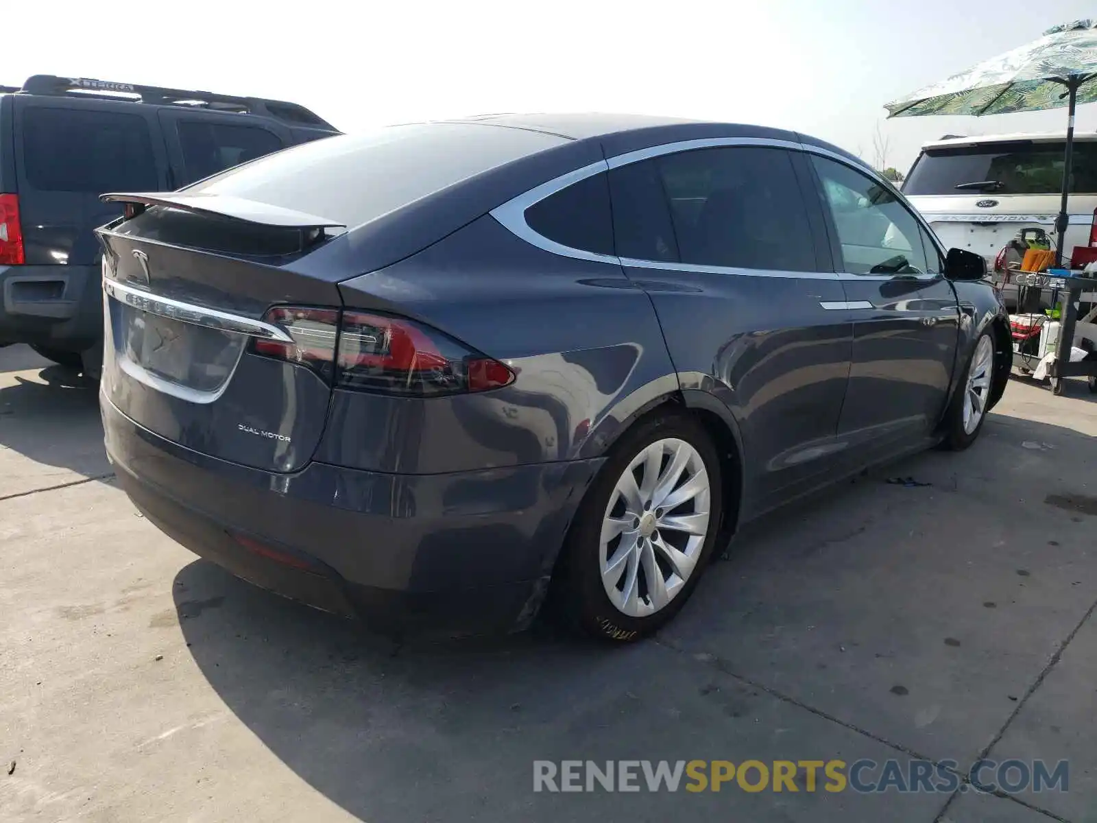 4 Photograph of a damaged car 5YJXCBE2XMF323605 TESLA MODEL X 2021