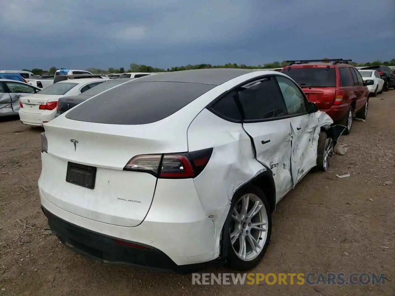 4 Photograph of a damaged car 5YJYGDEE0LF009989 TESLA MODEL Y 2020