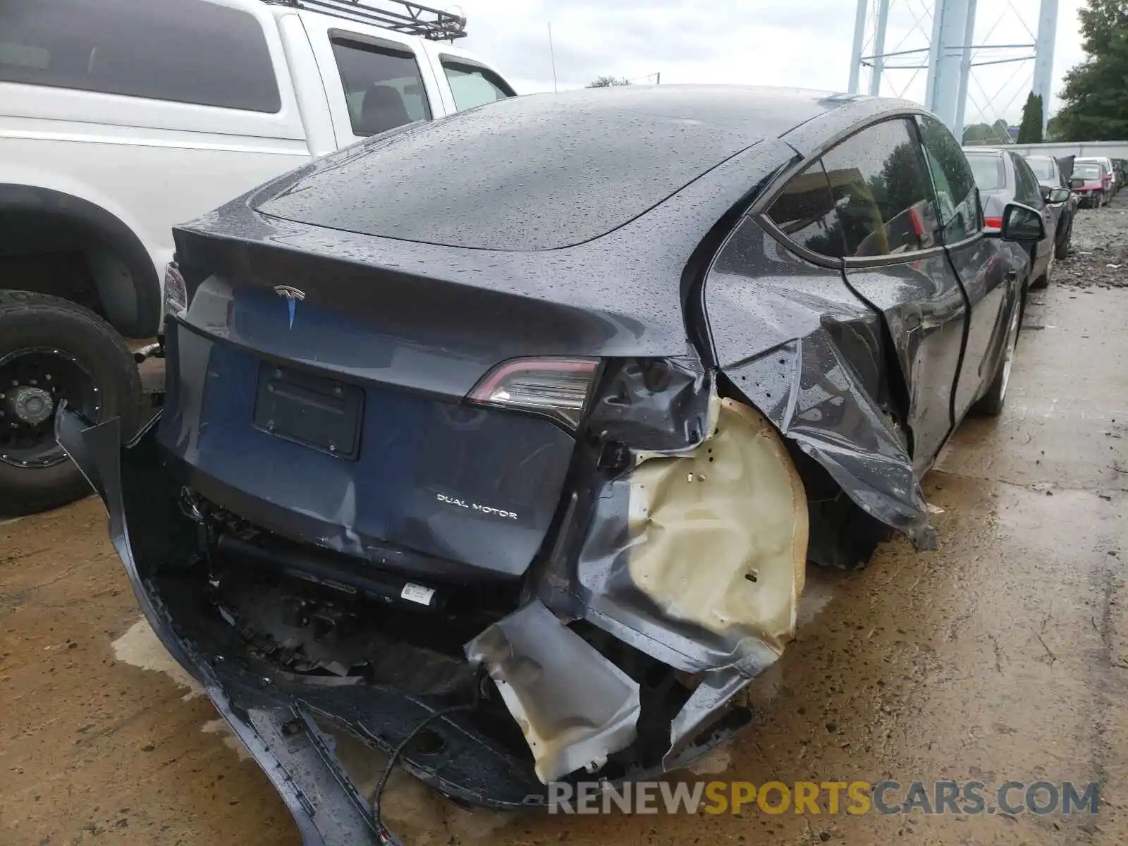 4 Photograph of a damaged car 5YJYGDEE0LF010219 TESLA MODEL Y 2020