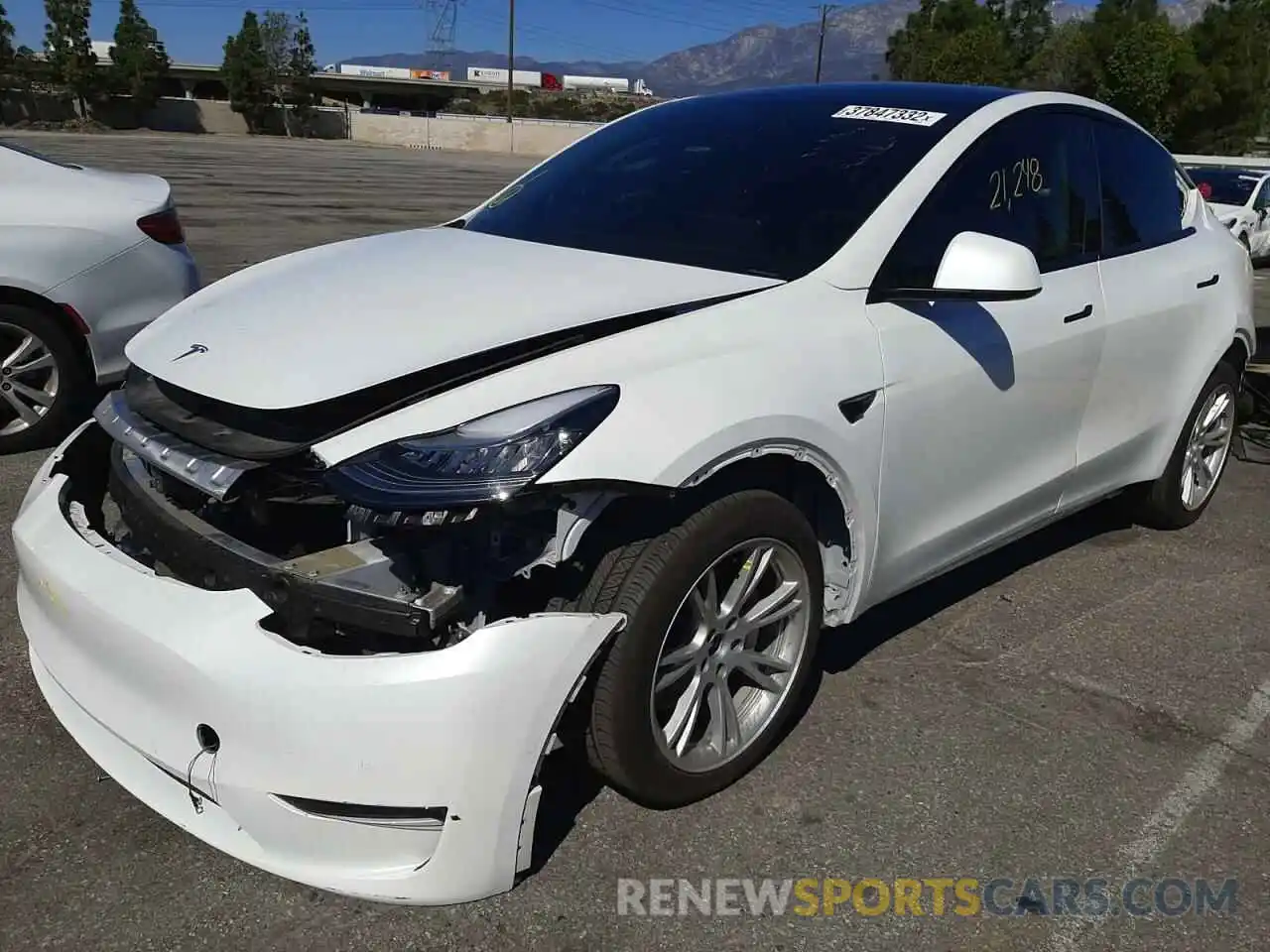 2 Photograph of a damaged car 5YJYGDEE0LF010298 TESLA MODEL Y 2020