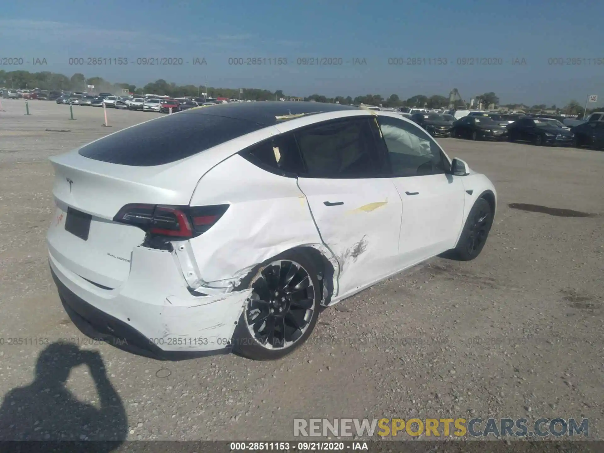 4 Photograph of a damaged car 5YJYGDEE0LF012827 TESLA MODEL Y 2020