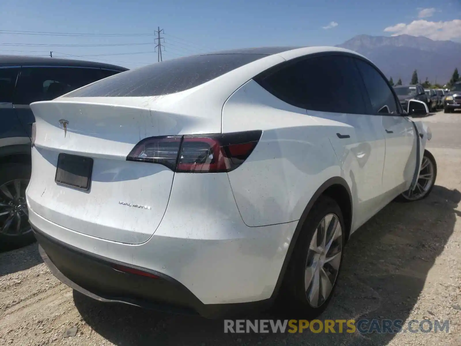 4 Photograph of a damaged car 5YJYGDEE0LF015274 TESLA MODEL Y 2020