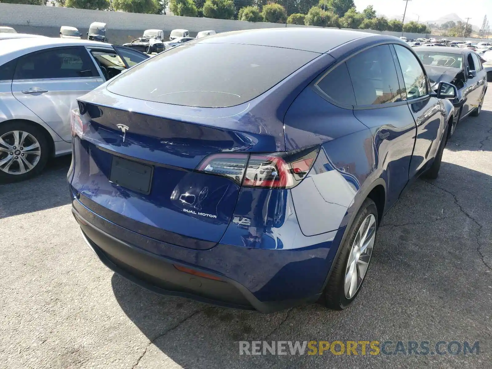 4 Photograph of a damaged car 5YJYGDEE0LF023083 TESLA MODEL Y 2020