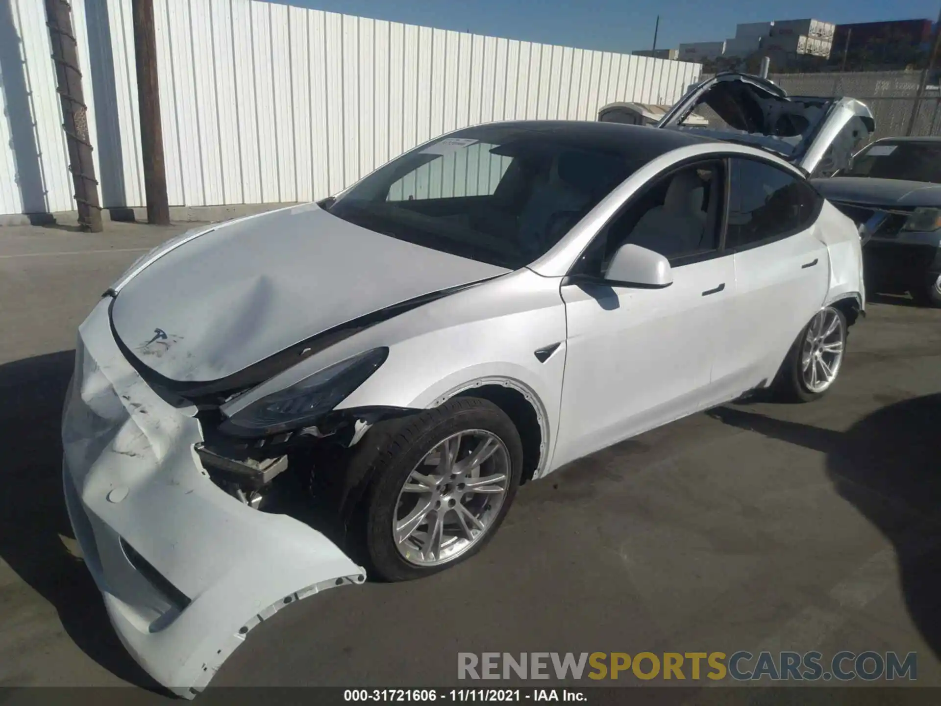 2 Photograph of a damaged car 5YJYGDEE0LF023603 TESLA MODEL Y 2020