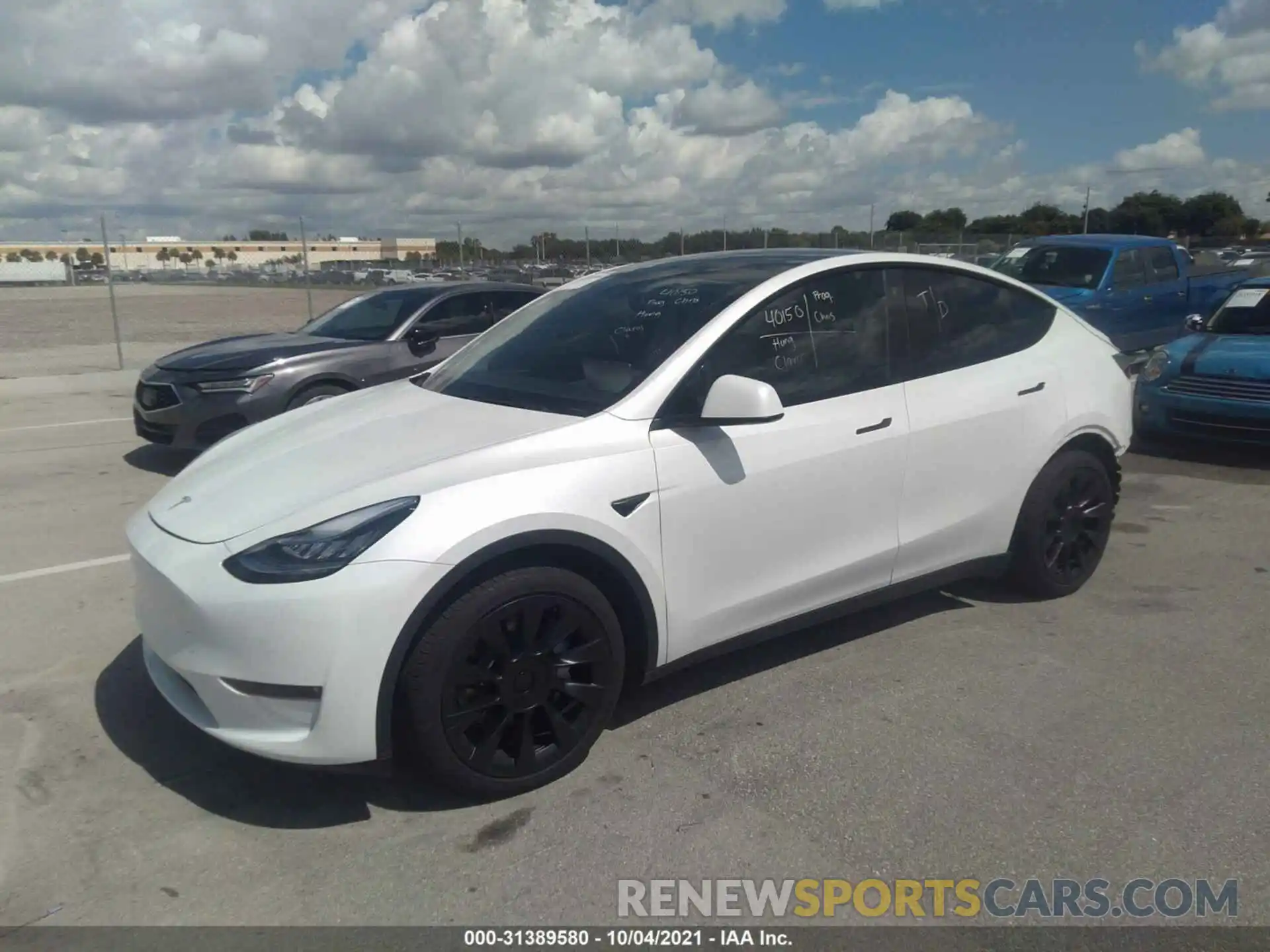 2 Photograph of a damaged car 5YJYGDEE0LF037159 TESLA MODEL Y 2020