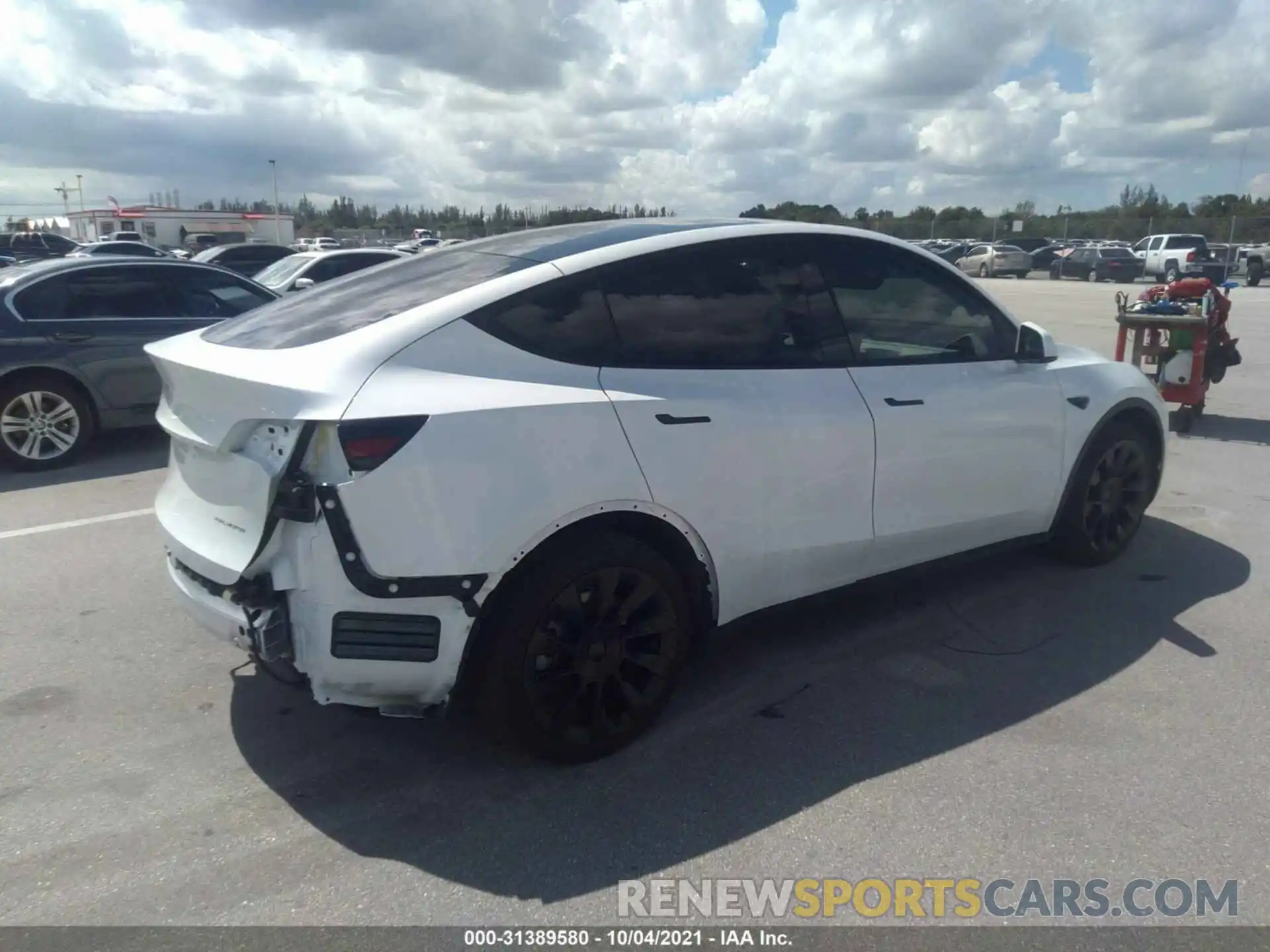 4 Photograph of a damaged car 5YJYGDEE0LF037159 TESLA MODEL Y 2020