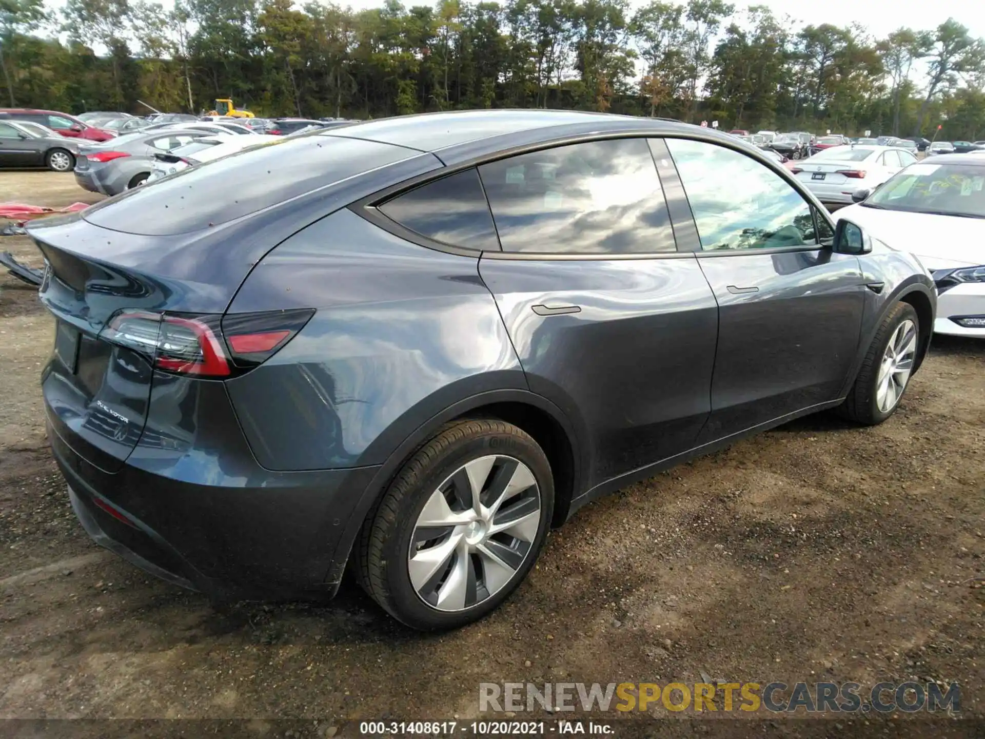 4 Photograph of a damaged car 5YJYGDEE1LF013260 TESLA MODEL Y 2020