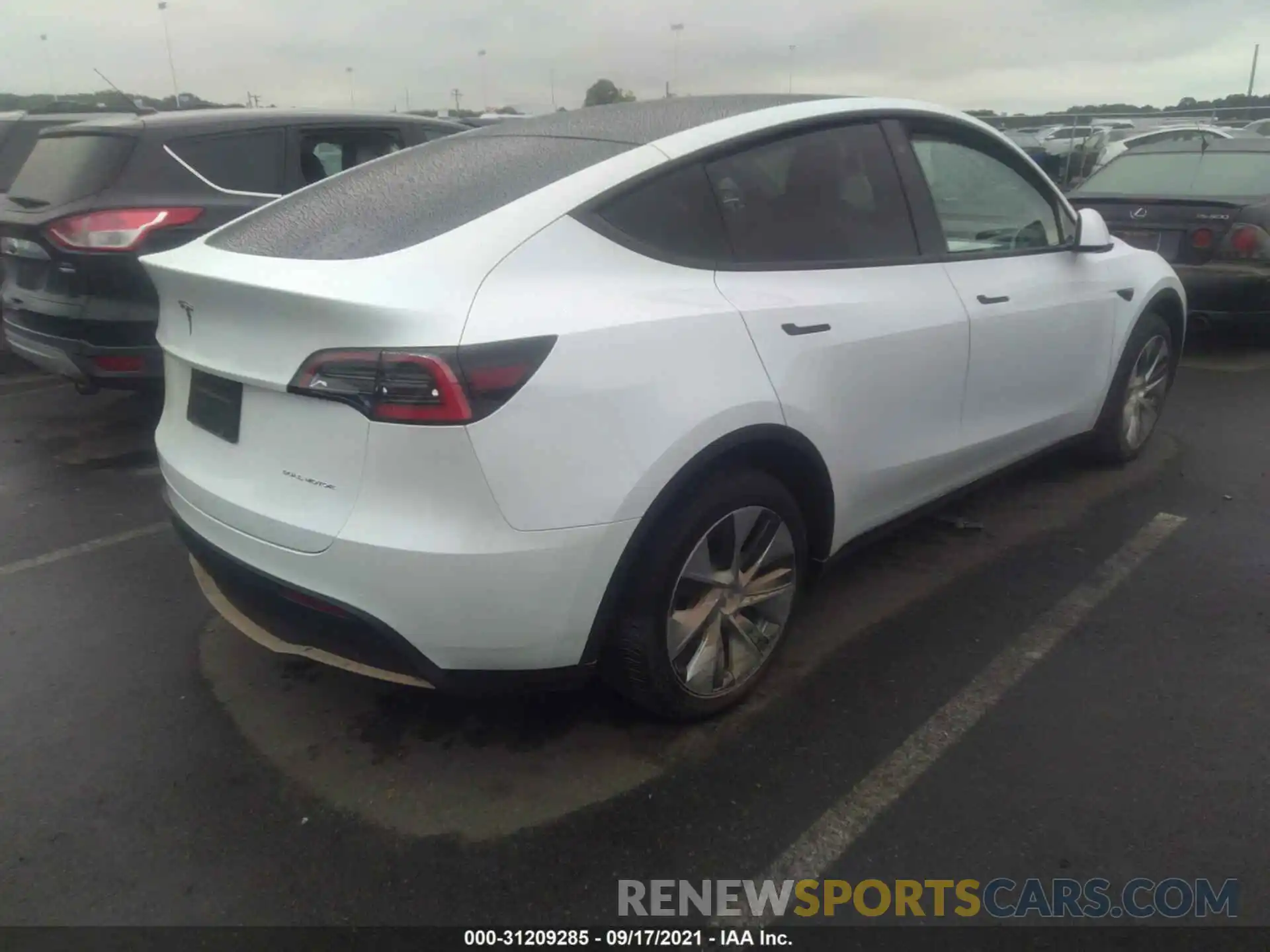 4 Photograph of a damaged car 5YJYGDEE1LF041463 TESLA MODEL Y 2020