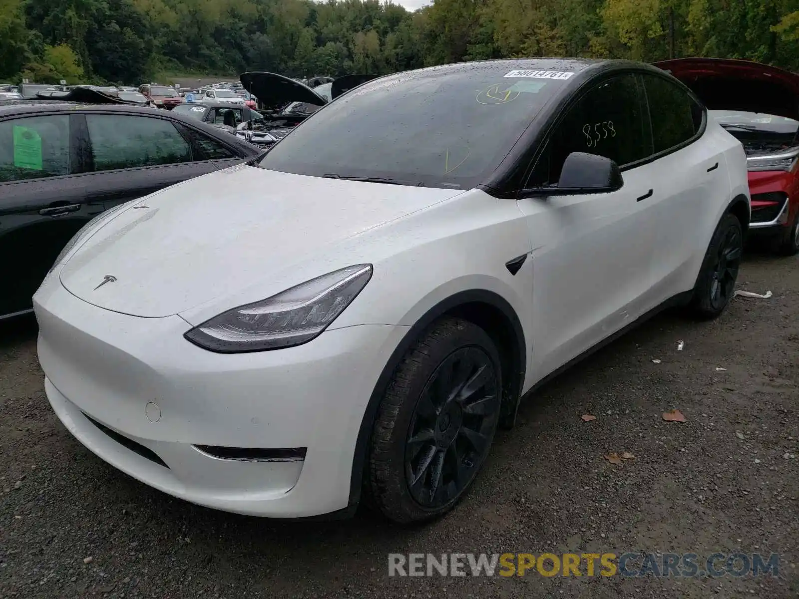 2 Photograph of a damaged car 5YJYGDEE2LF004325 TESLA MODEL Y 2020