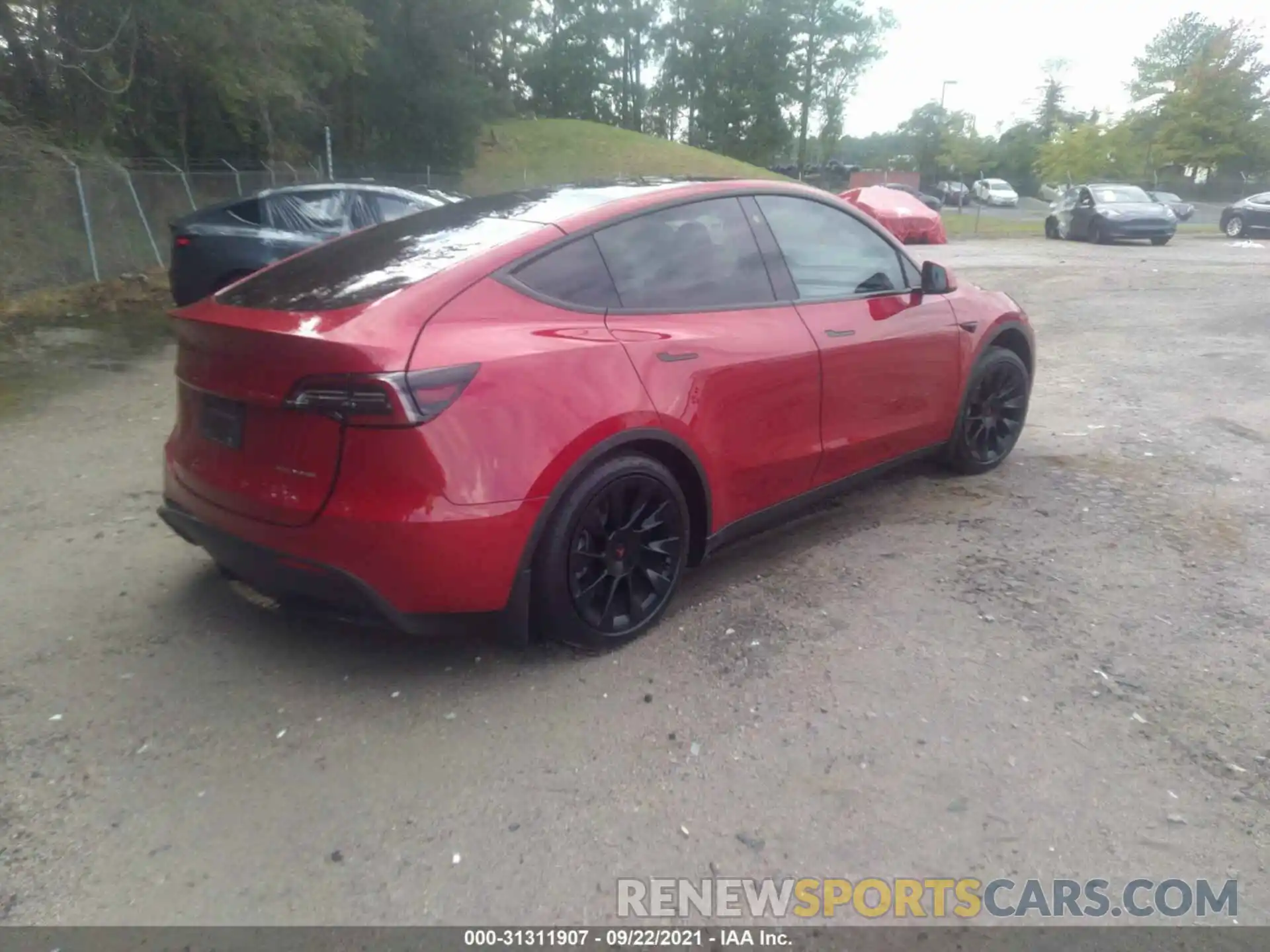 4 Photograph of a damaged car 5YJYGDEE2LF008262 TESLA MODEL Y 2020