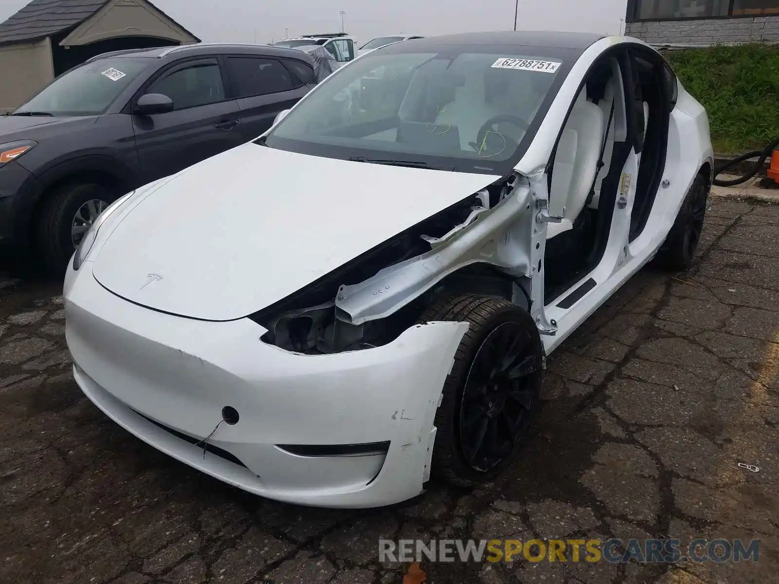 2 Photograph of a damaged car 5YJYGDEE2LF034294 TESLA MODEL Y 2020