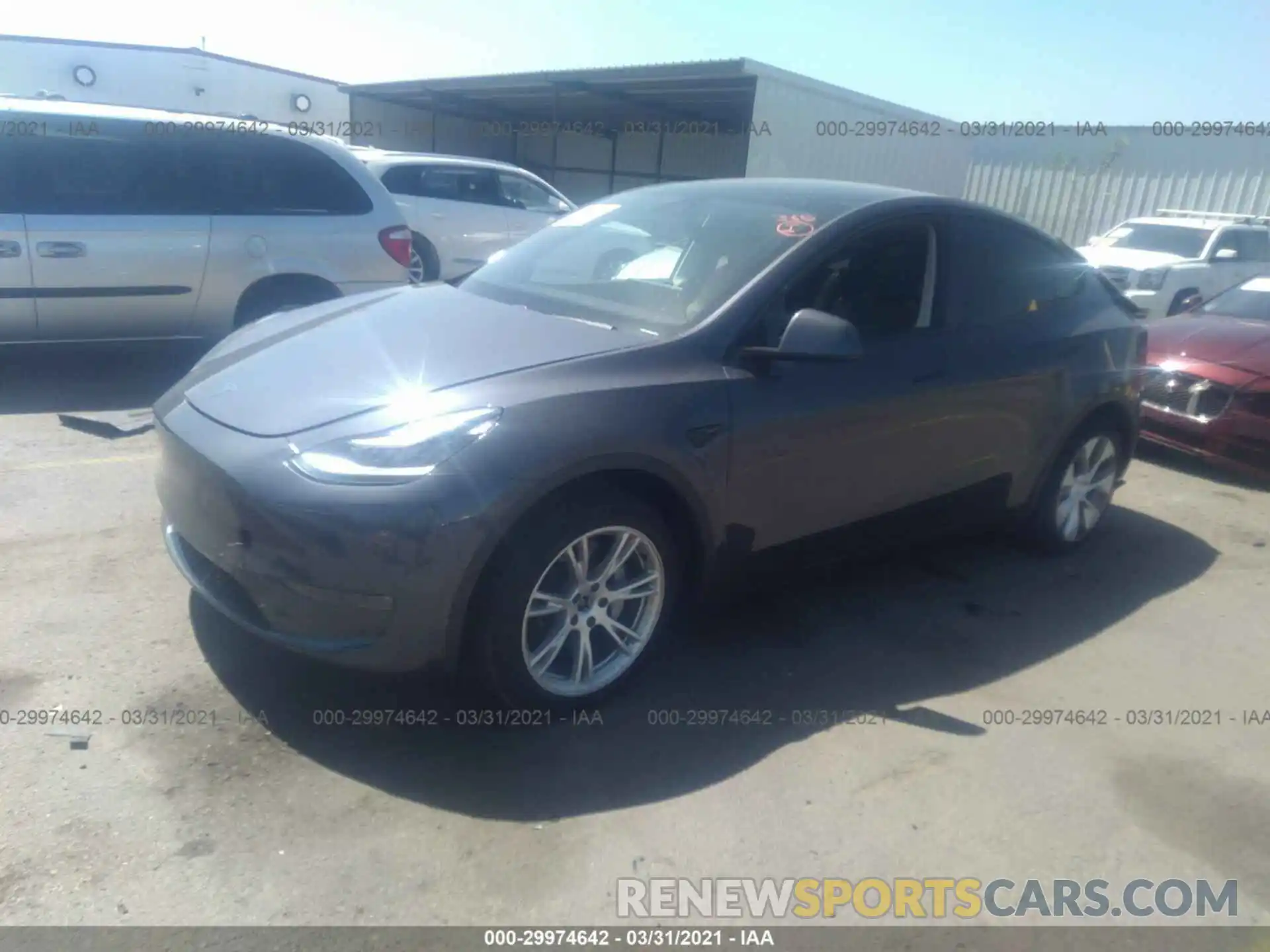 2 Photograph of a damaged car 5YJYGDEE2LF050592 TESLA MODEL Y 2020