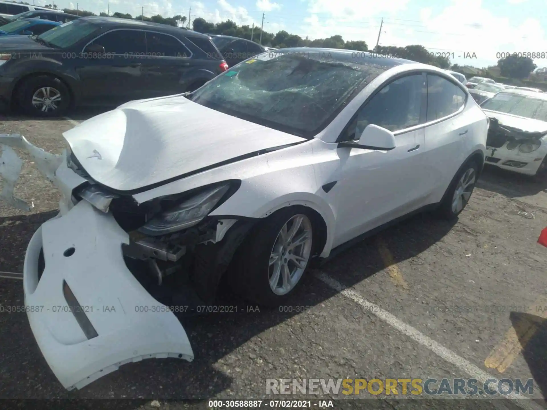 2 Photograph of a damaged car 5YJYGDEE3LF034997 TESLA MODEL Y 2020