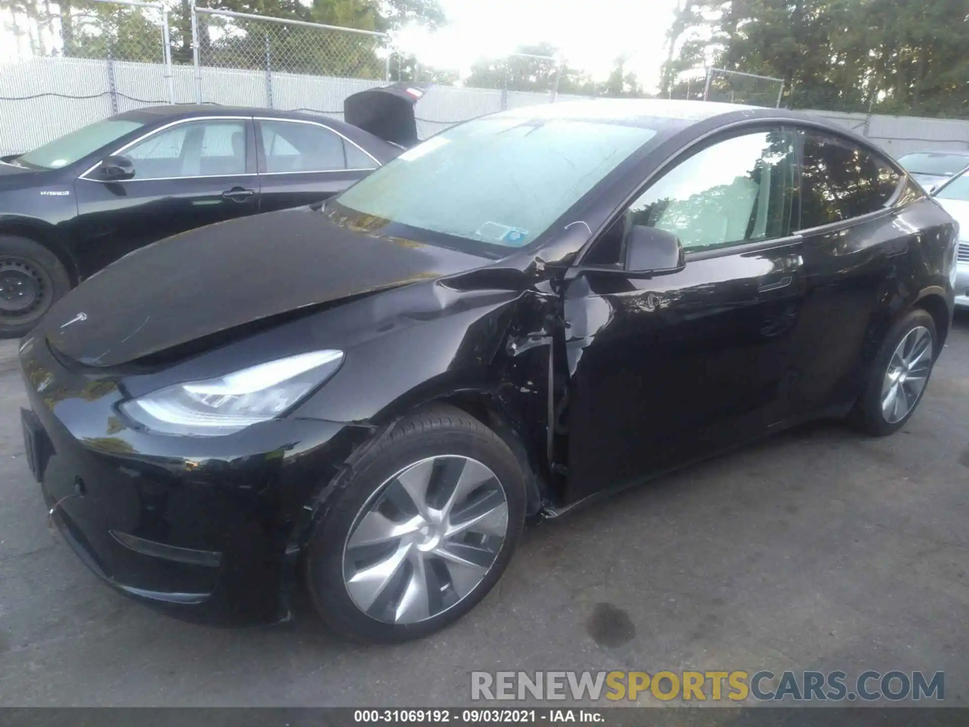 2 Photograph of a damaged car 5YJYGDEE3LF049757 TESLA MODEL Y 2020