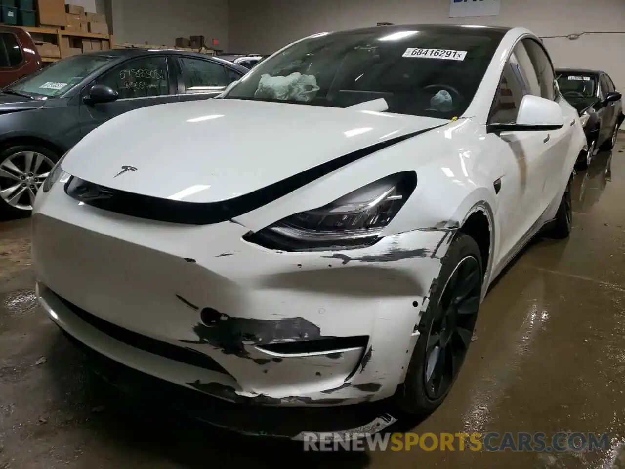 2 Photograph of a damaged car 5YJYGDEE3LF058586 TESLA MODEL Y 2020