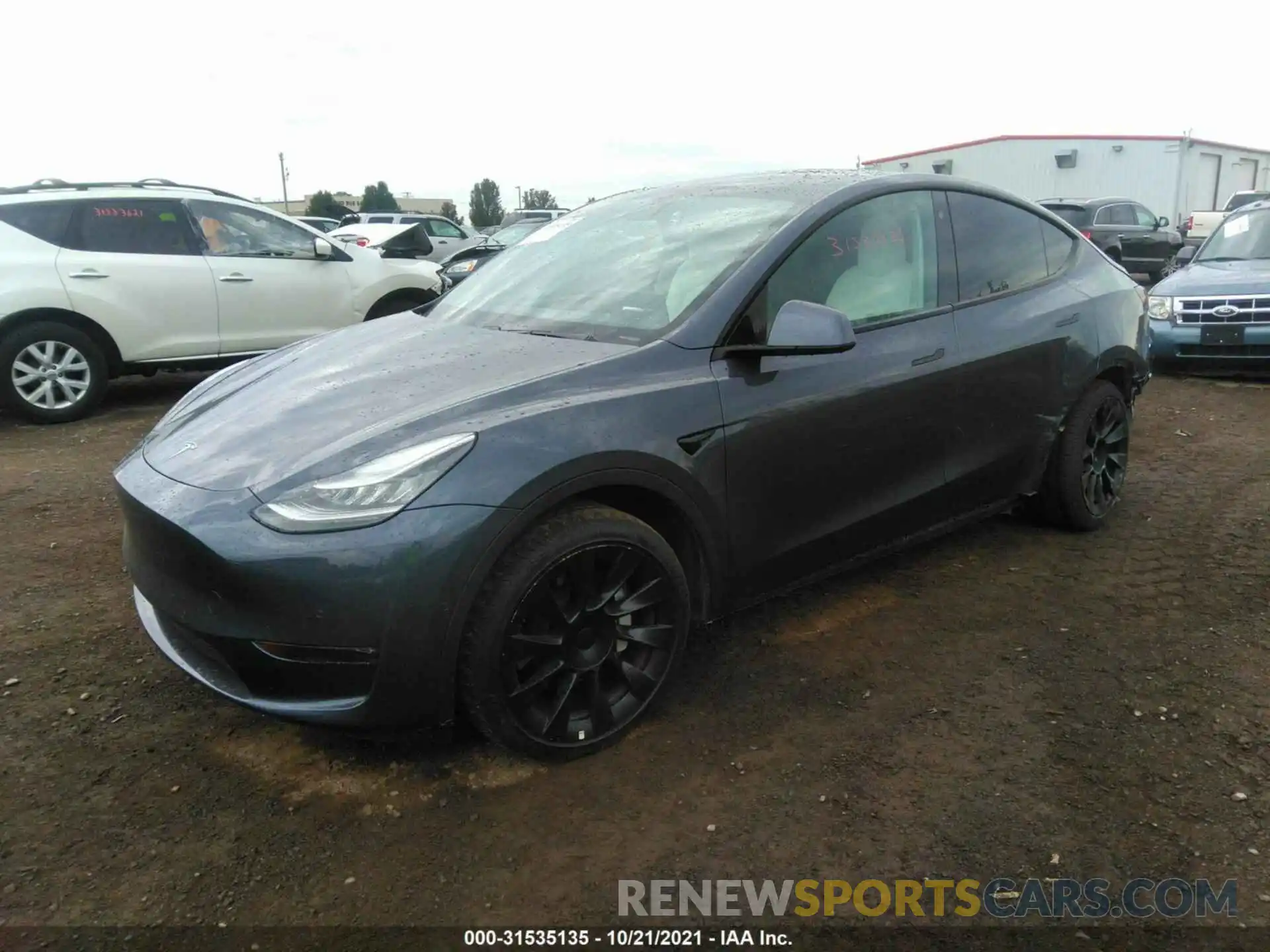 2 Photograph of a damaged car 5YJYGDEE4LF034796 TESLA MODEL Y 2020