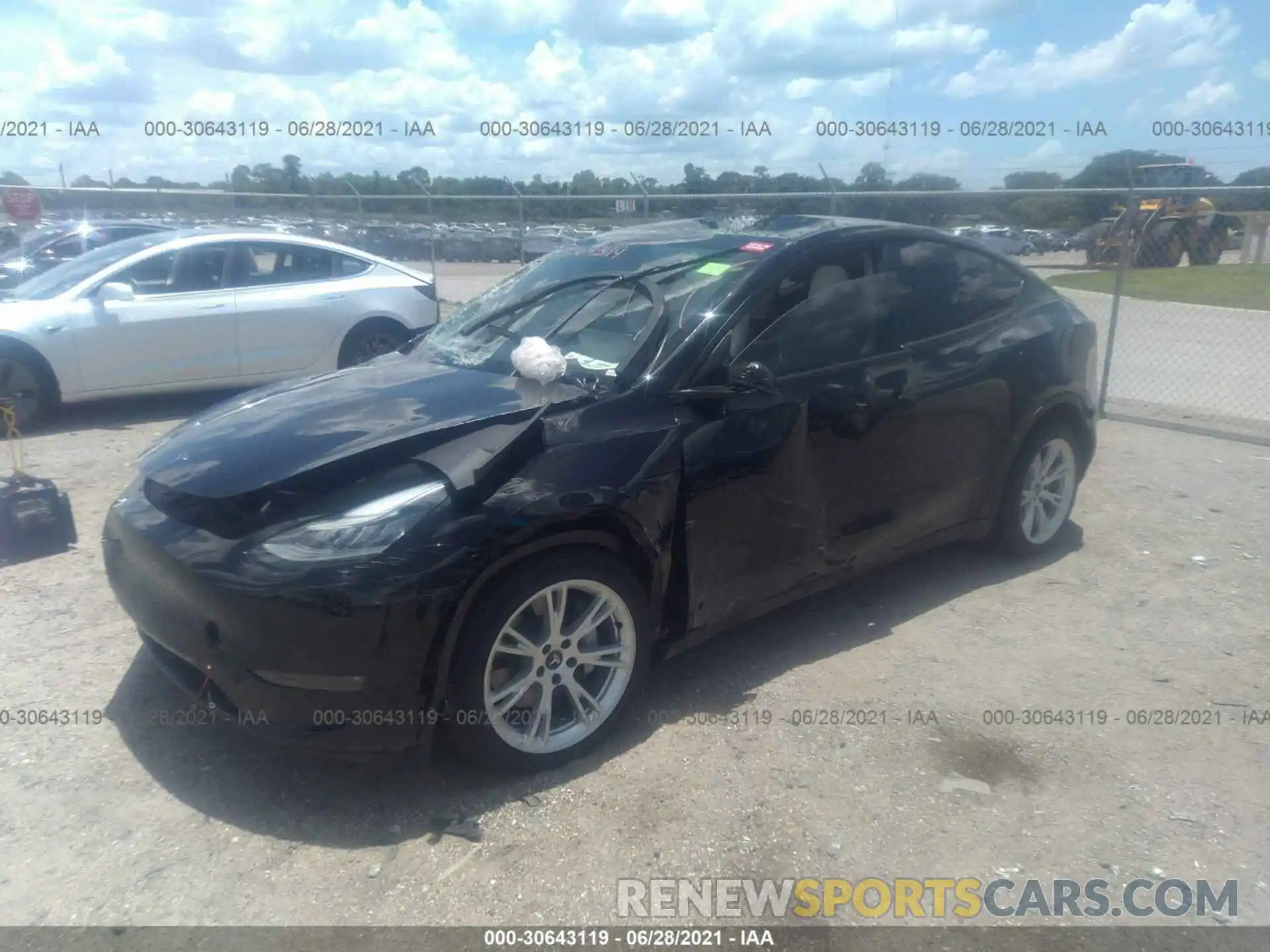 2 Photograph of a damaged car 5YJYGDEE4LF043014 TESLA MODEL Y 2020