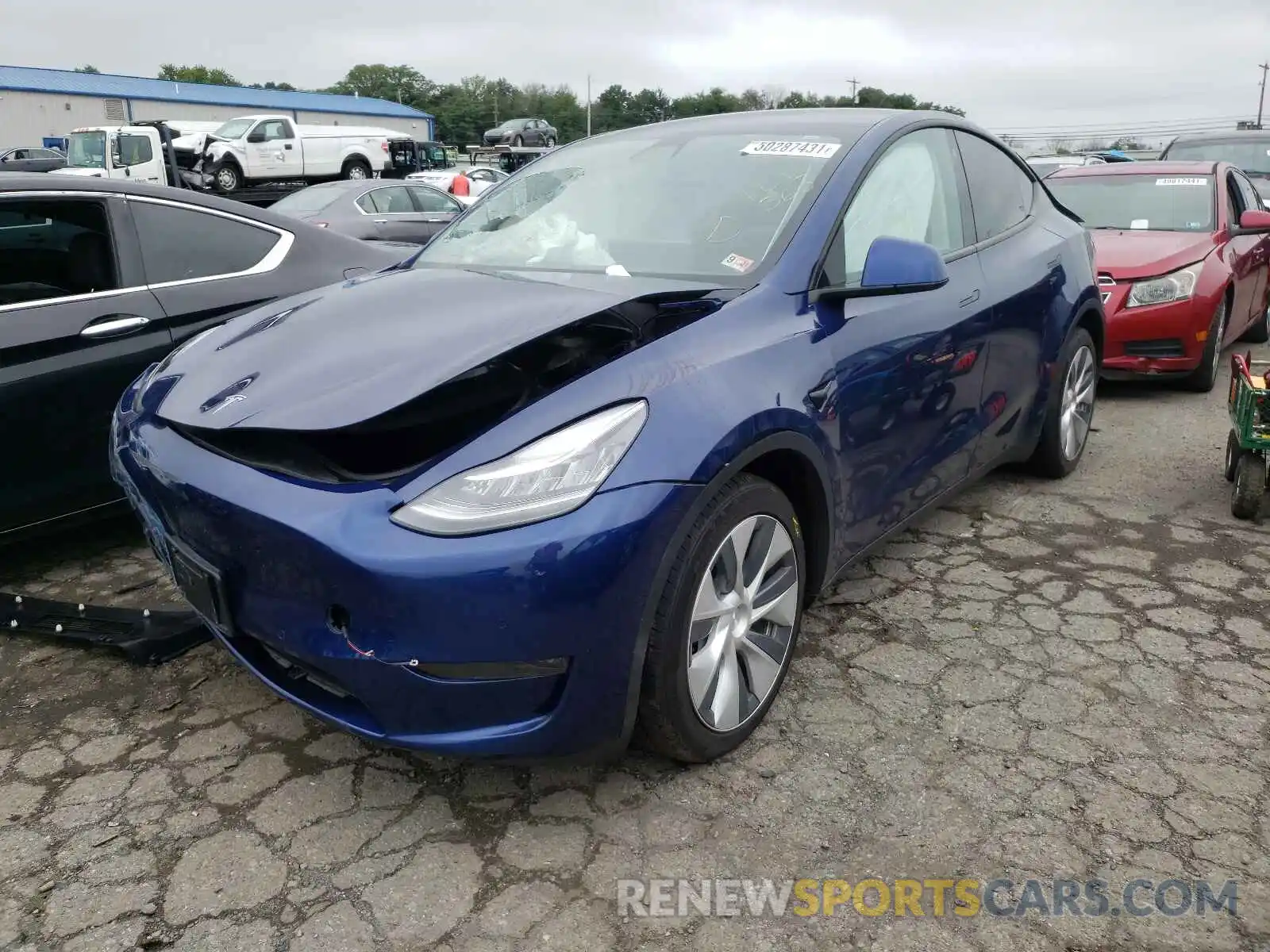 2 Photograph of a damaged car 5YJYGDEE4LF047533 TESLA MODEL Y 2020