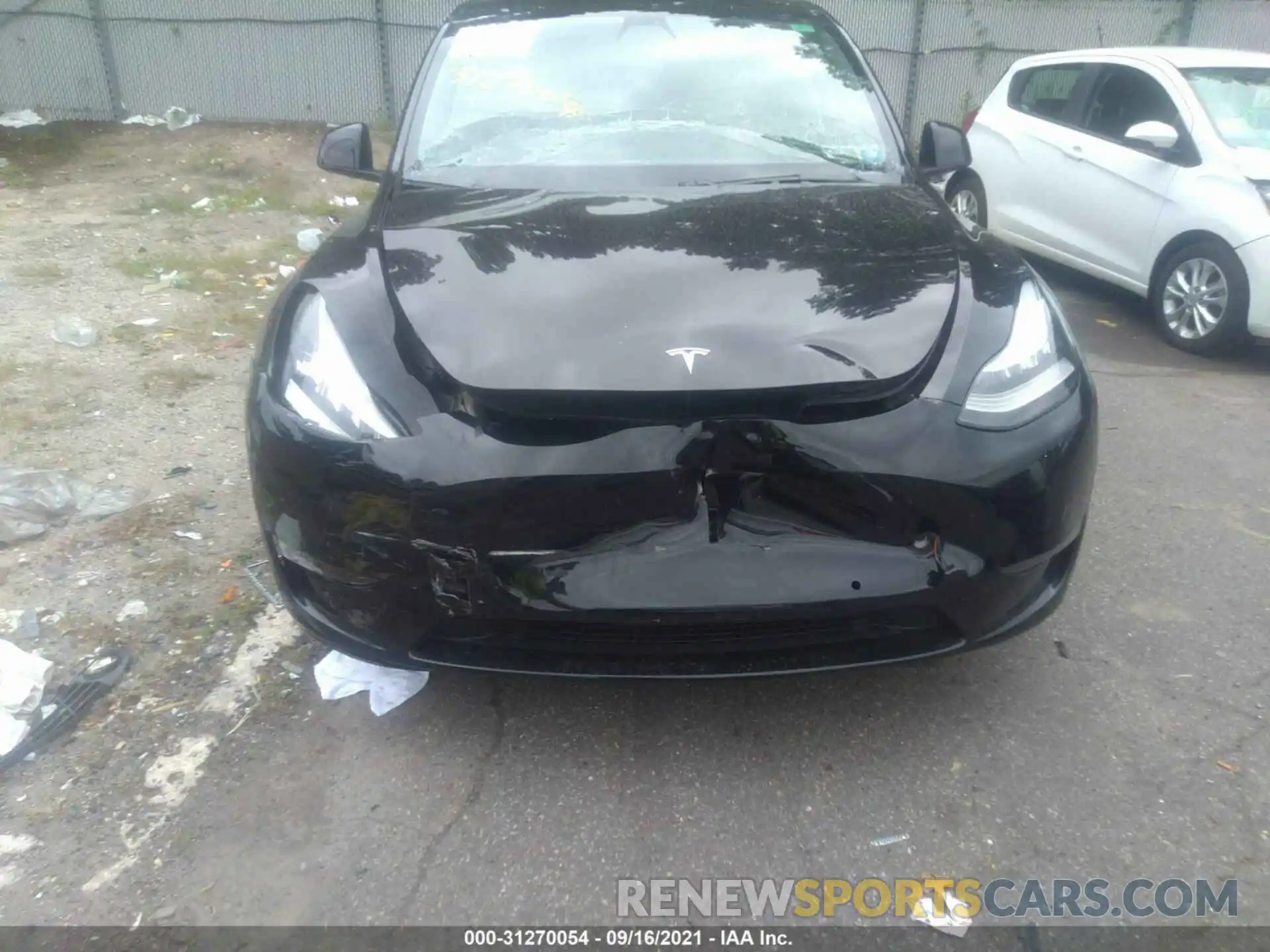 6 Photograph of a damaged car 5YJYGDEE4LF048827 TESLA MODEL Y 2020