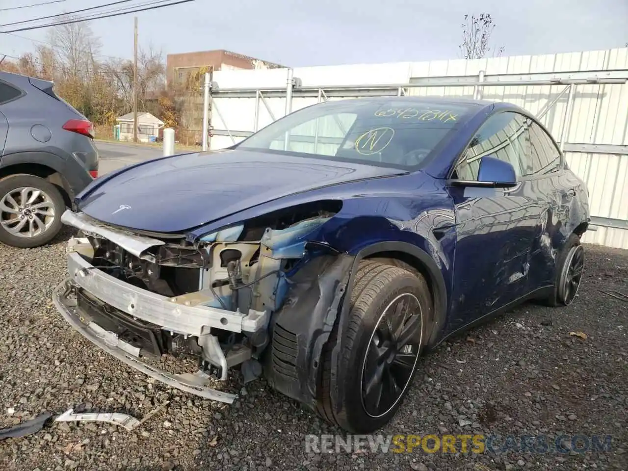 2 Photograph of a damaged car 5YJYGDEE6LF011679 TESLA MODEL Y 2020