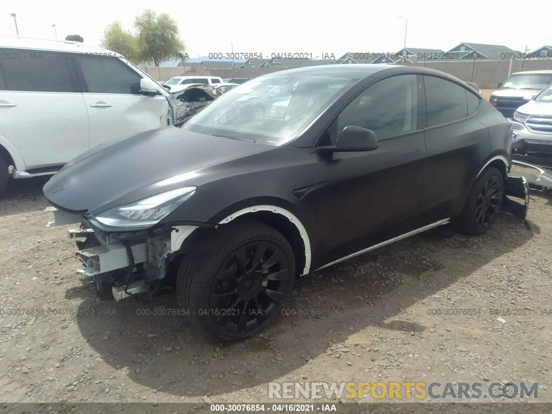 2 Photograph of a damaged car 5YJYGDEE6LF041975 TESLA MODEL Y 2020