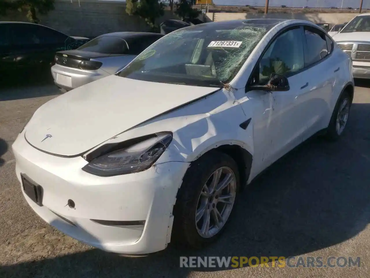 2 Photograph of a damaged car 5YJYGDEE6LF054547 TESLA MODEL Y 2020