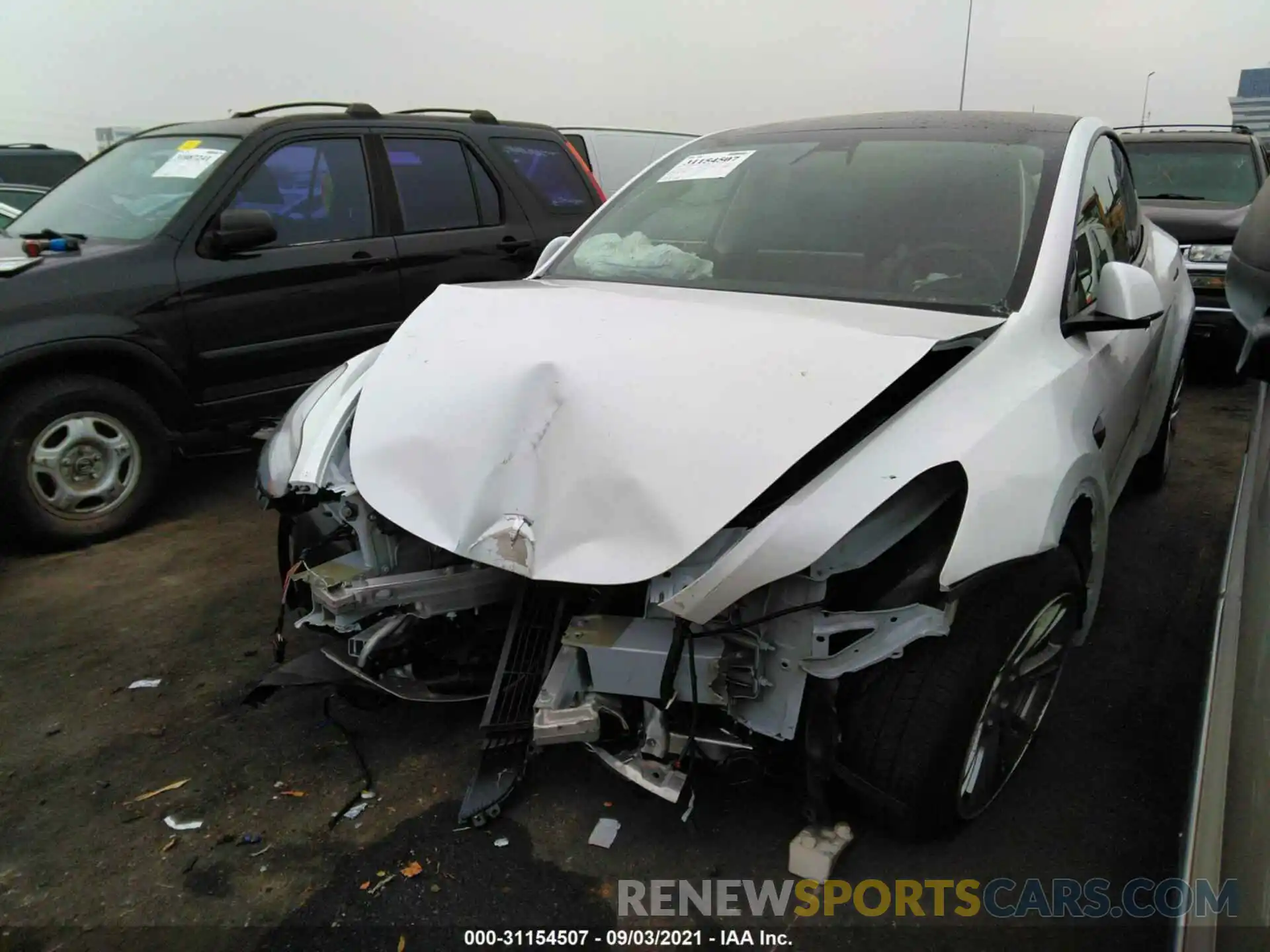 2 Photograph of a damaged car 5YJYGDEE6LF057870 TESLA MODEL Y 2020