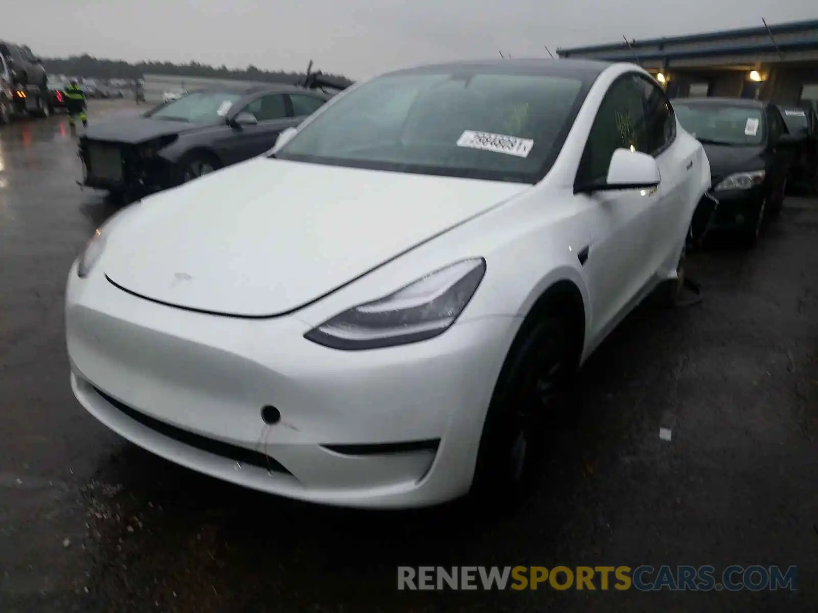 2 Photograph of a damaged car 5YJYGDEE7LF008905 TESLA MODEL Y 2020