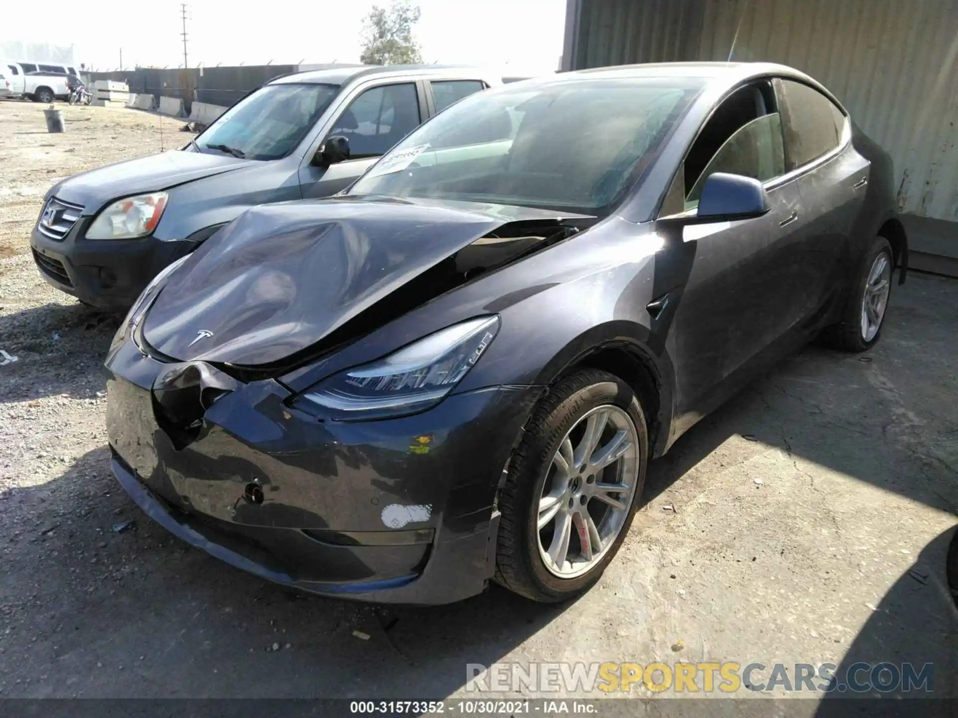 2 Photograph of a damaged car 5YJYGDEE7LF010248 TESLA MODEL Y 2020