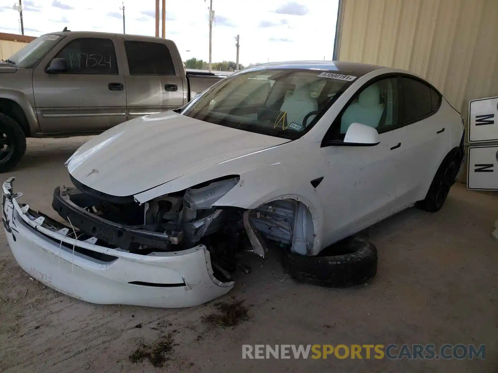 2 Photograph of a damaged car 5YJYGDEE7LF034243 TESLA MODEL Y 2020