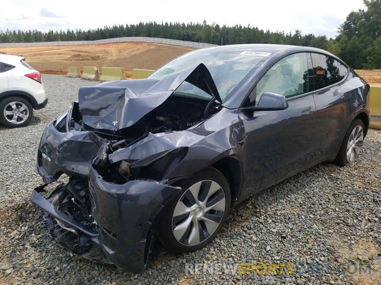 2 Photograph of a damaged car 5YJYGDEE7LF036638 TESLA MODEL Y 2020