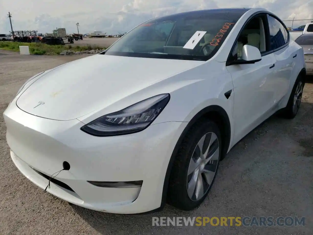 2 Photograph of a damaged car 5YJYGDEE7LF049857 TESLA MODEL Y 2020