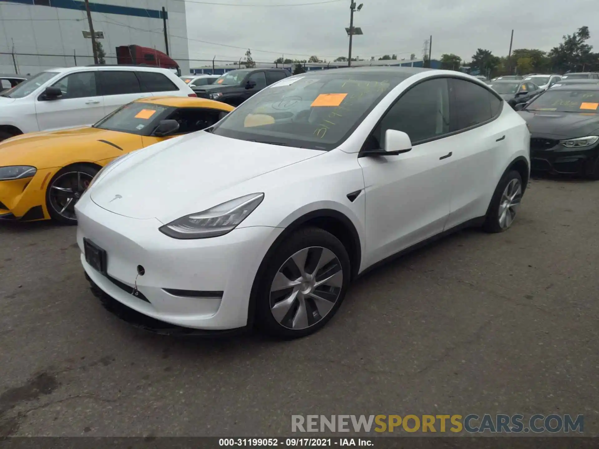 2 Photograph of a damaged car 5YJYGDEE8LF024885 TESLA MODEL Y 2020