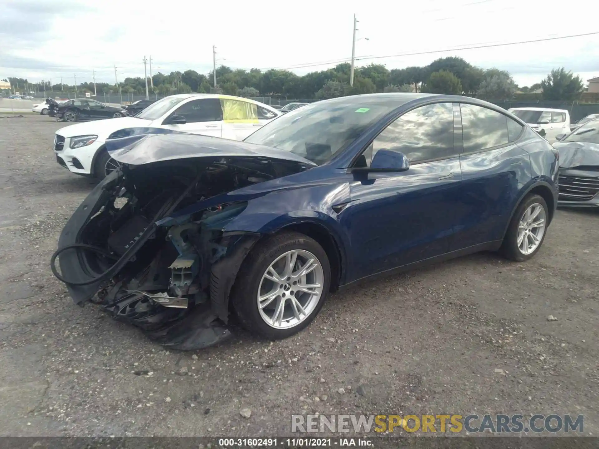 2 Photograph of a damaged car 5YJYGDEE8LF047888 TESLA MODEL Y 2020