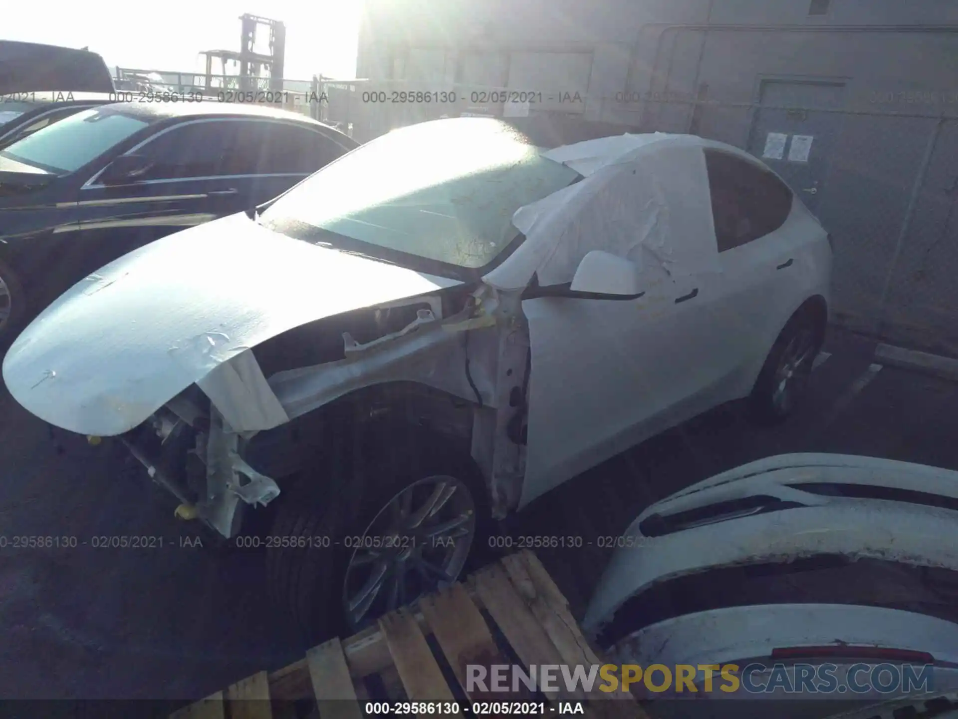 2 Photograph of a damaged car 5YJYGDEE8LF054663 TESLA MODEL Y 2020