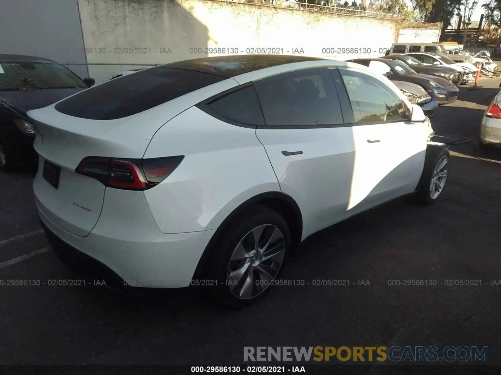 4 Photograph of a damaged car 5YJYGDEE8LF054663 TESLA MODEL Y 2020