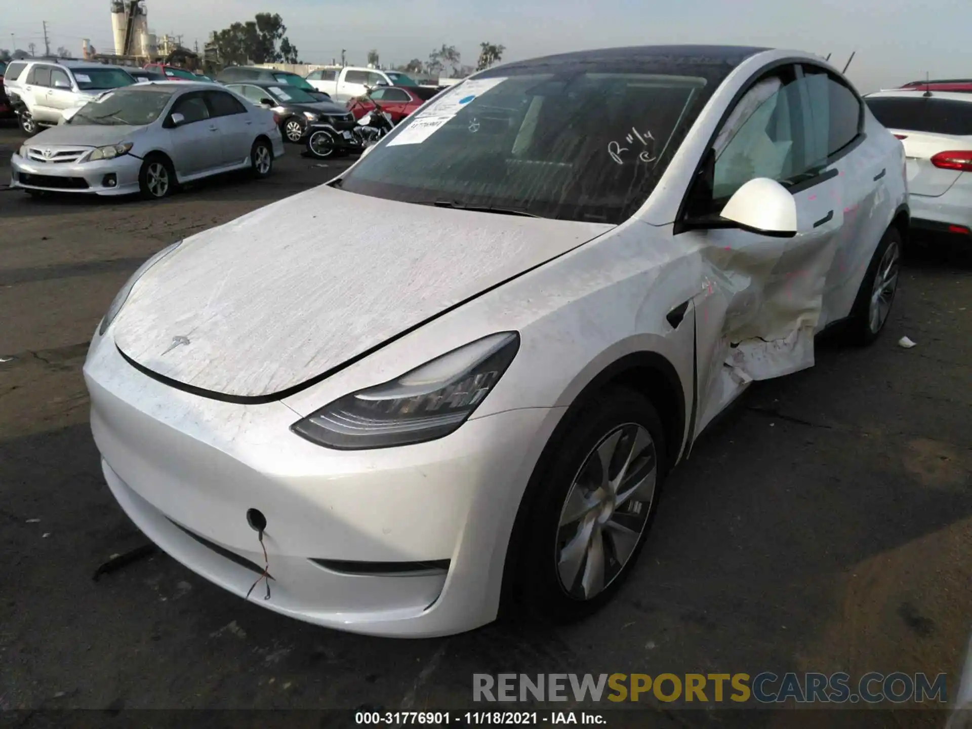 2 Photograph of a damaged car 5YJYGDEE9LF054719 TESLA MODEL Y 2020