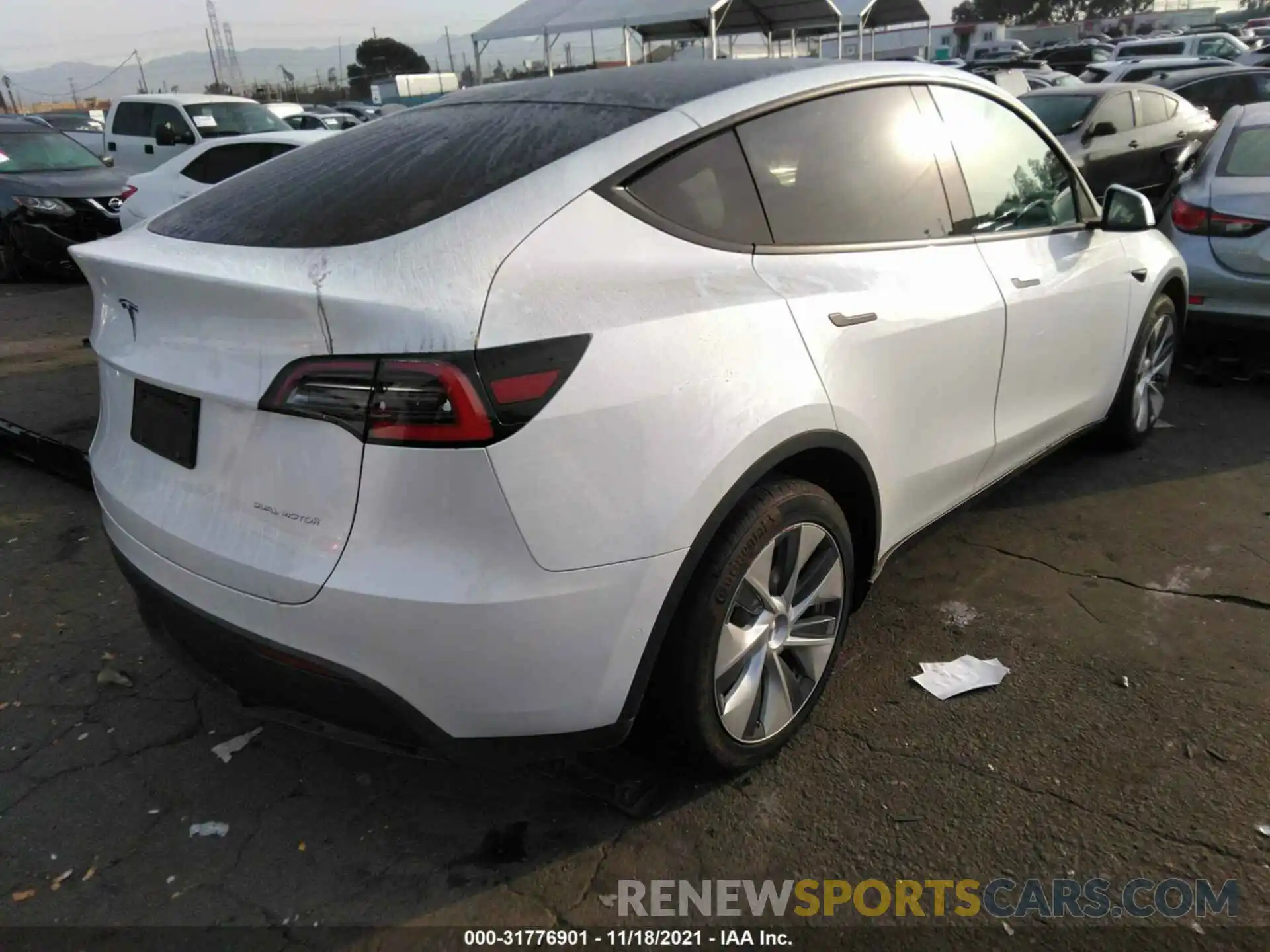 4 Photograph of a damaged car 5YJYGDEE9LF054719 TESLA MODEL Y 2020